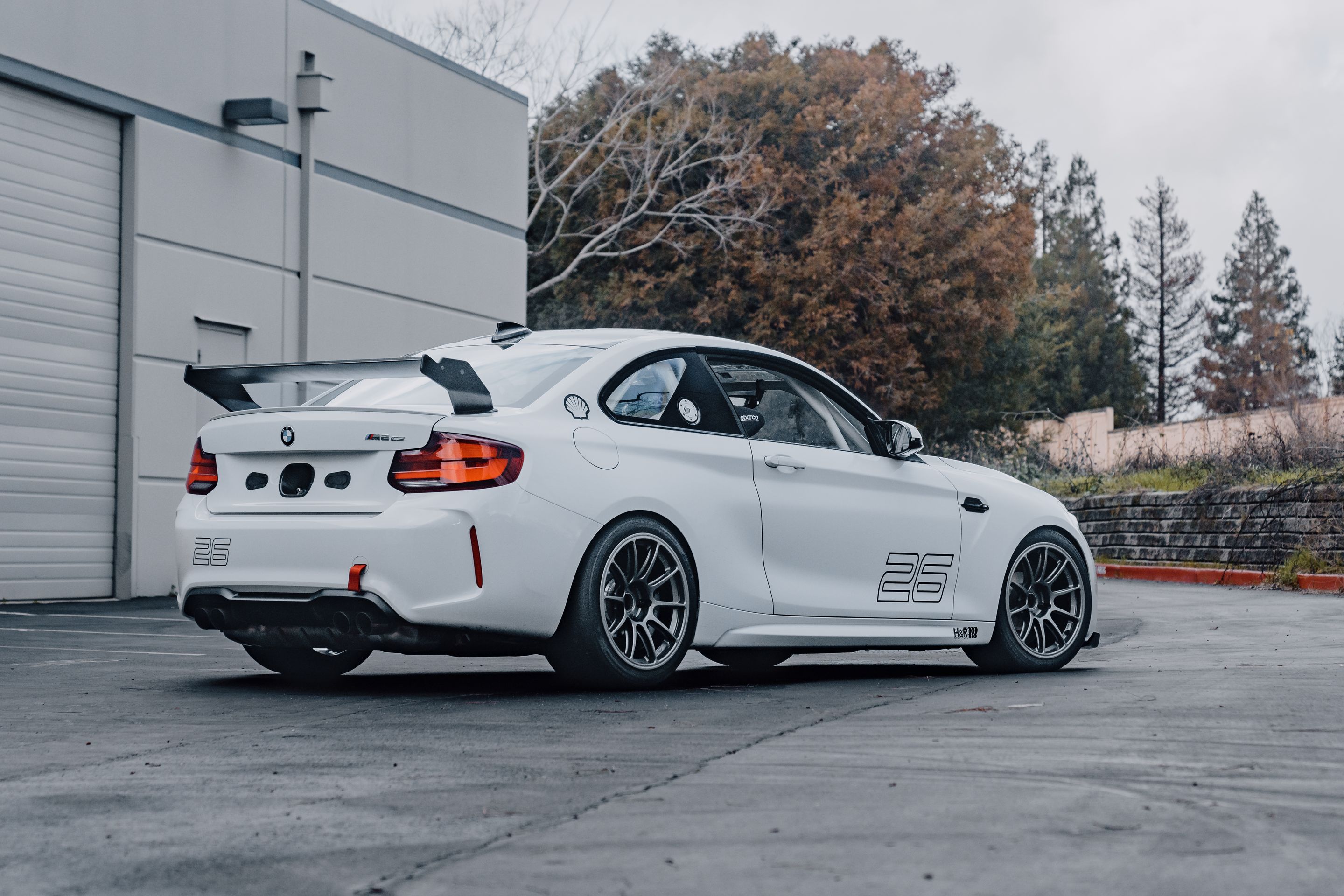 White BMW F87 M2 with 18" SM-10RE Apex wheels in Anthracite