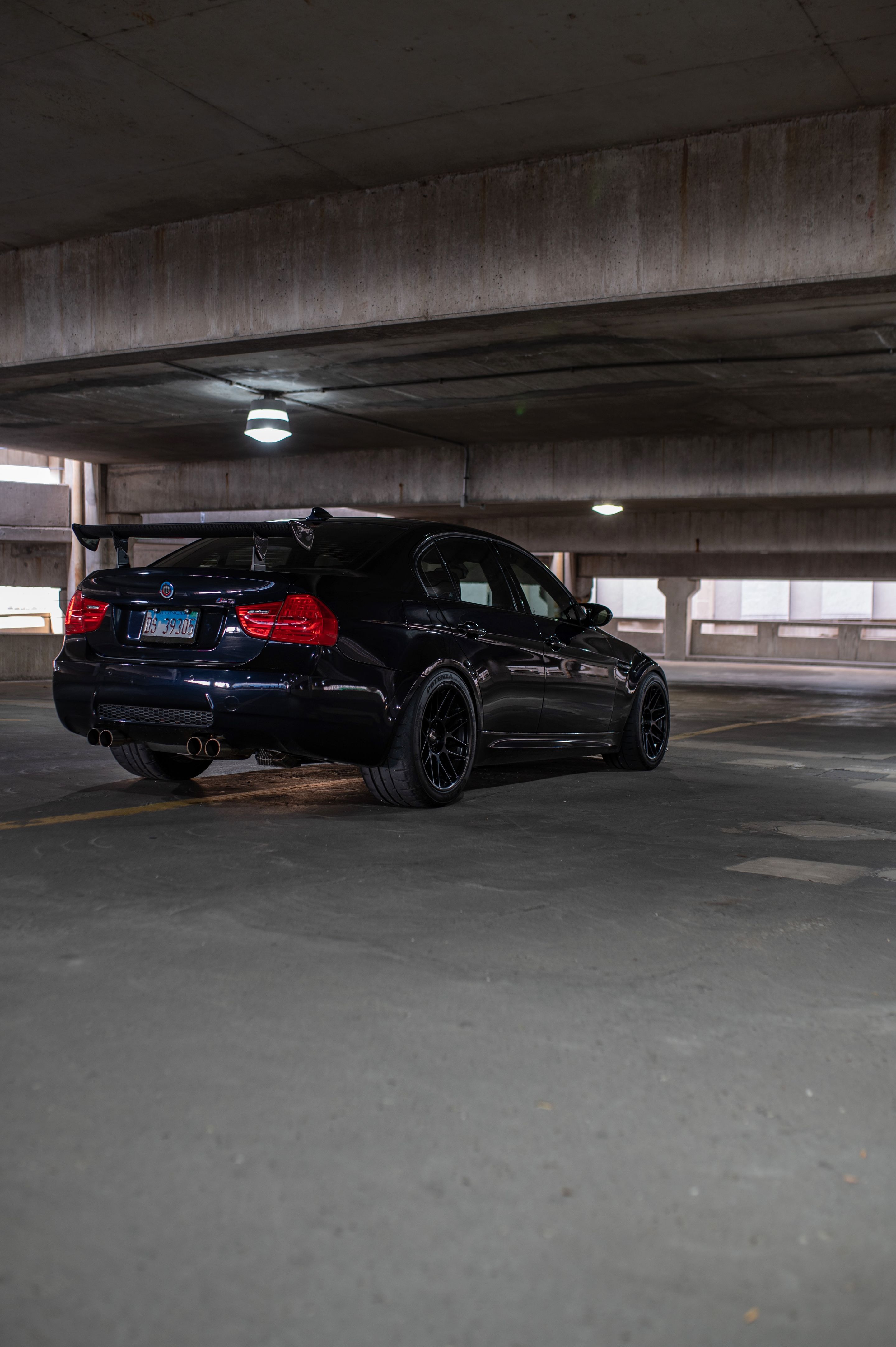 Black BMW E90 Sedan M3 with 18" ARC-8 Apex wheels in Satin Black