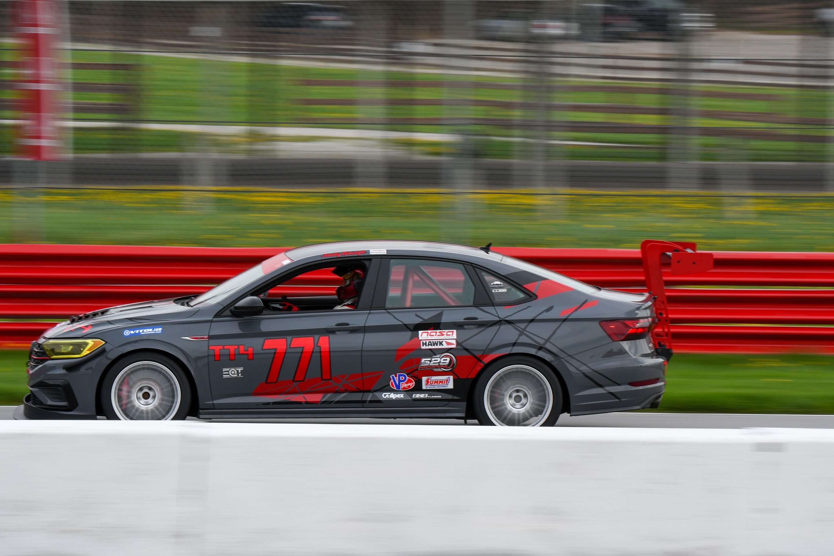 Race Livery VW MK7 GLI with 18" TC-10RT Apex wheels in Race Silver