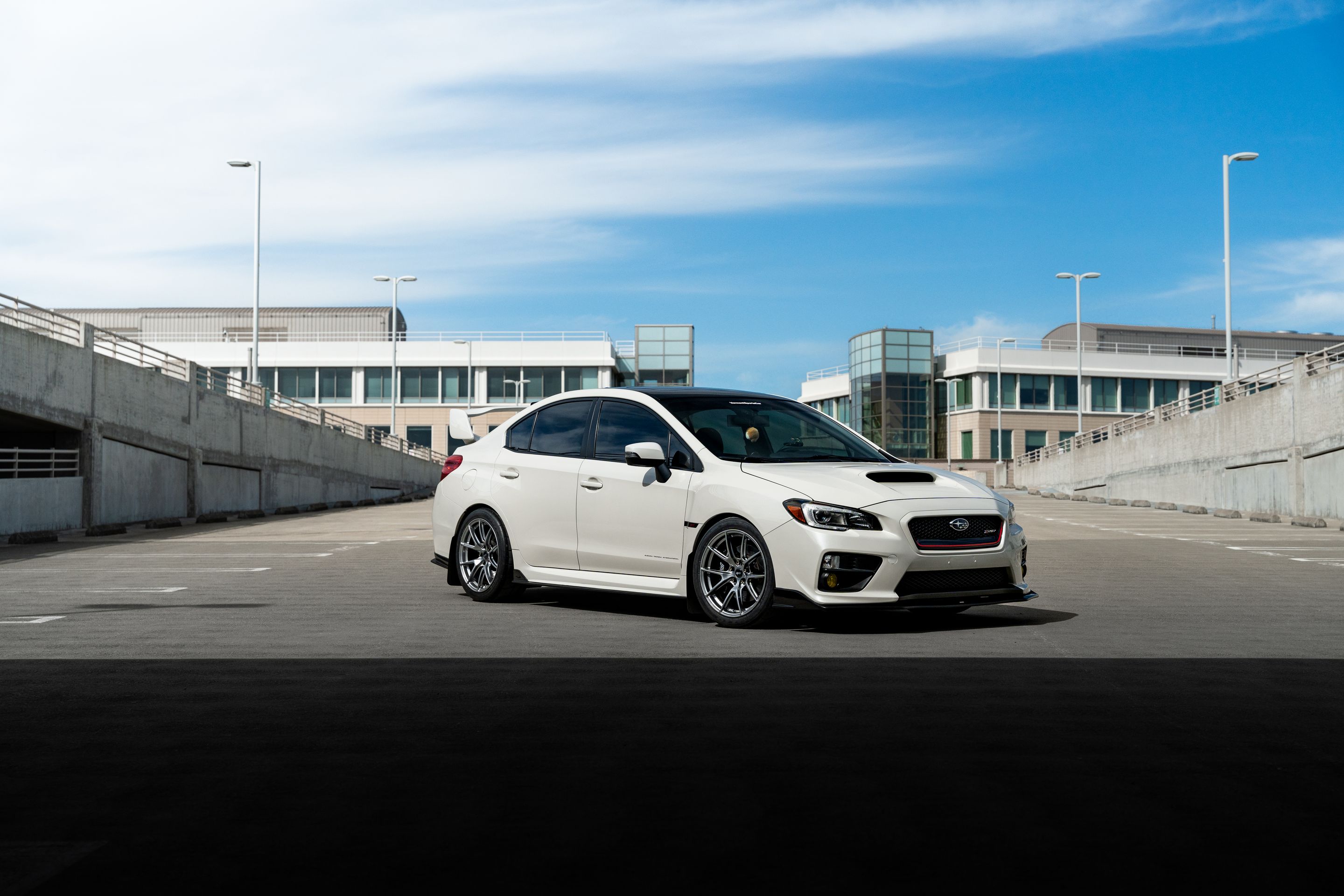 White Subaru VA WRX STI with 18" VS-5 Apex wheels in Hyper Black