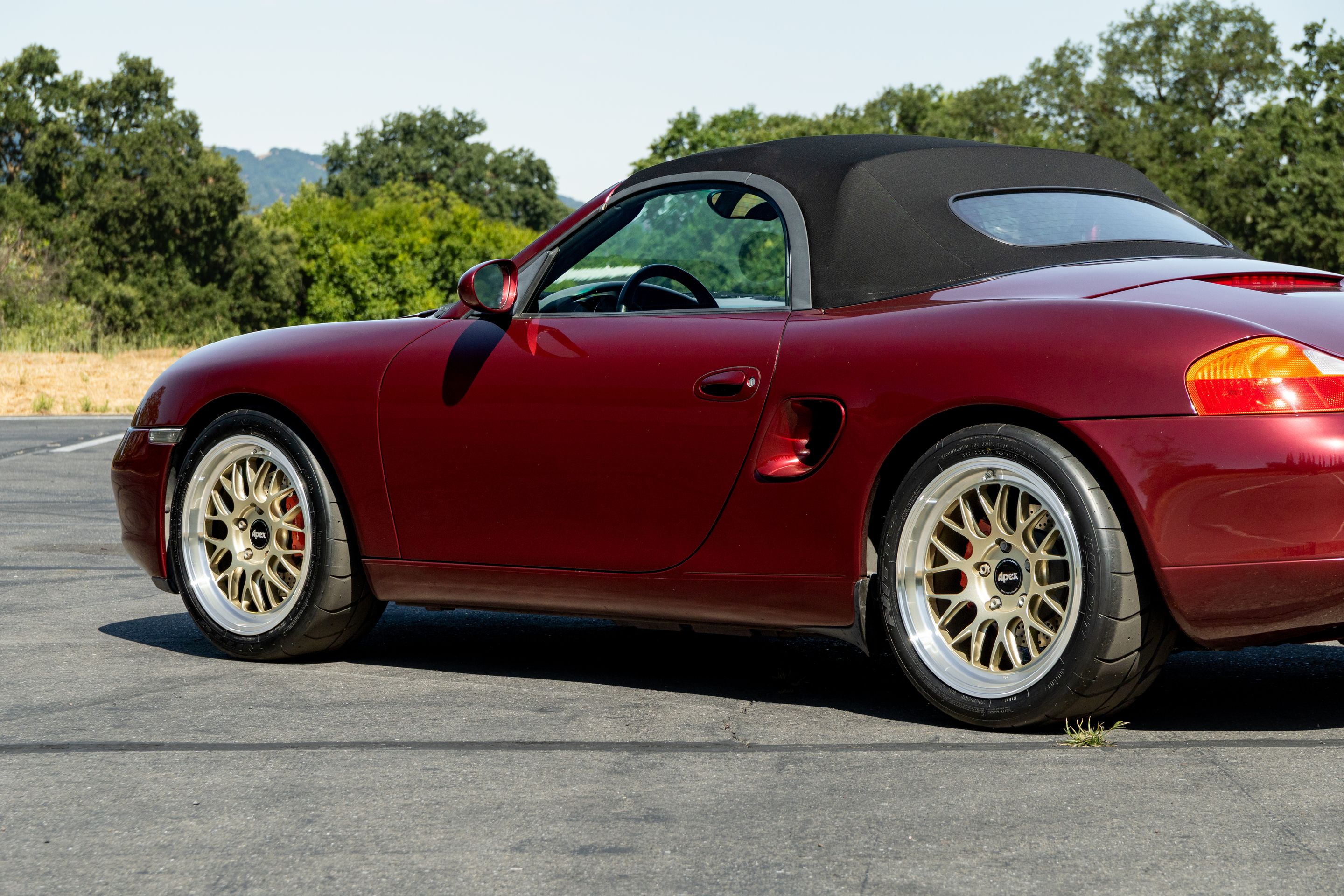 Red Porsche 986 Boxster with 18" ML-10RT Apex wheels in Machined Lip Gloss Motorsport Gold