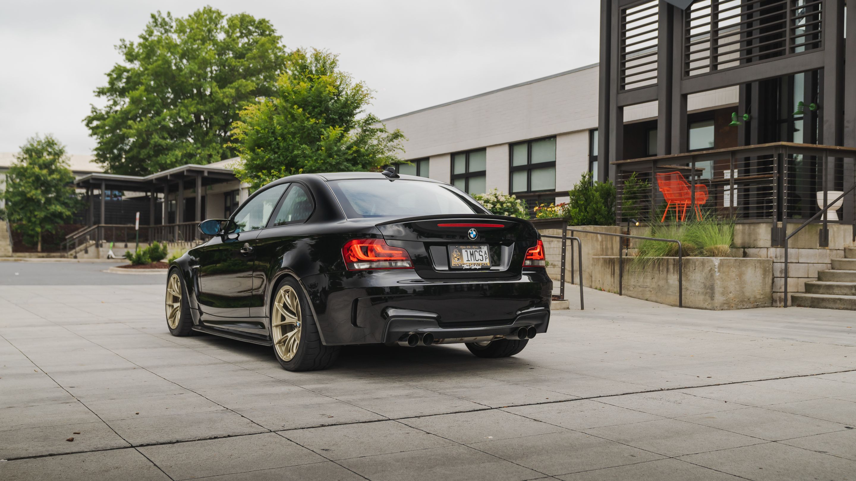 Black BMW E82 Coupe 1 Series with 18" VS-5RS Apex wheels in Motorsport Gold