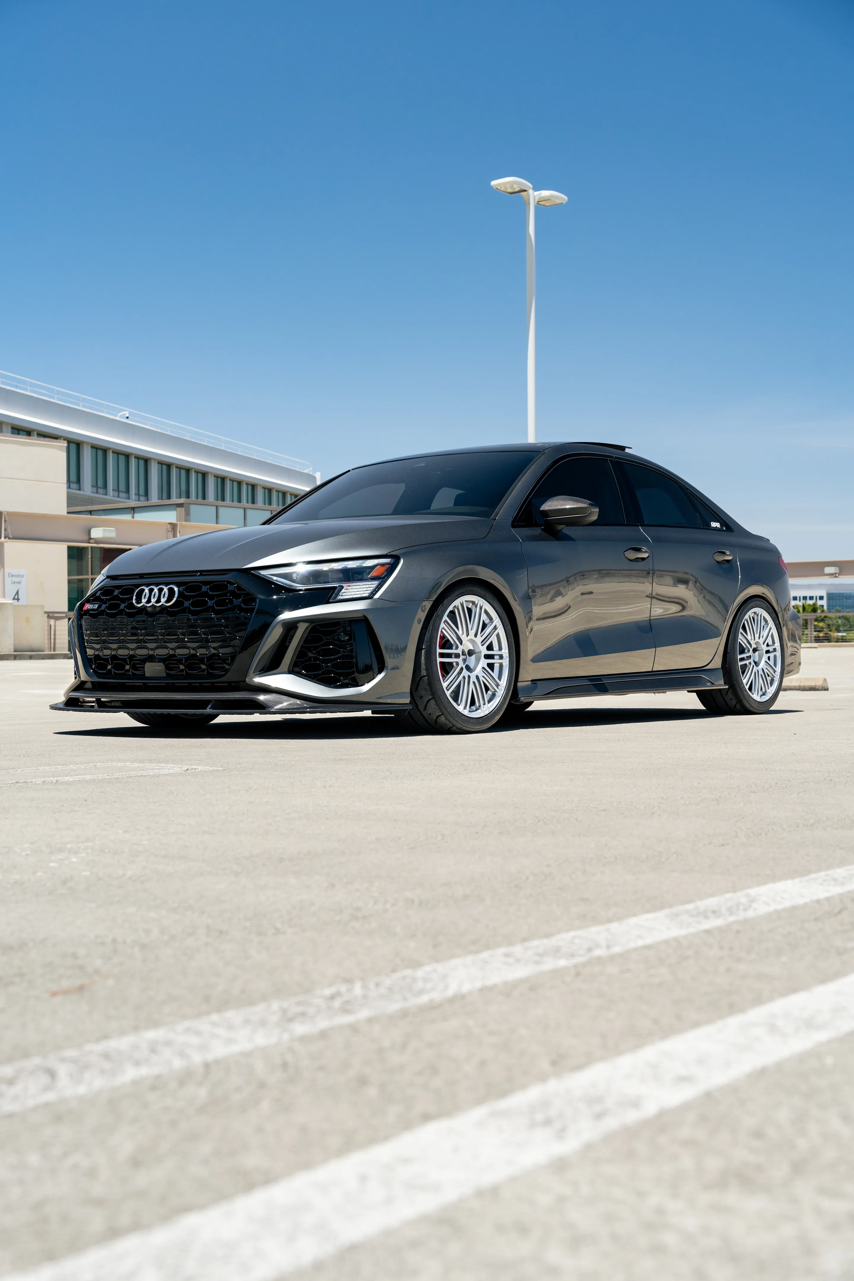 Grey Audi 8Y RS 3 with 18" TC-10RT Apex wheels in Race Silver