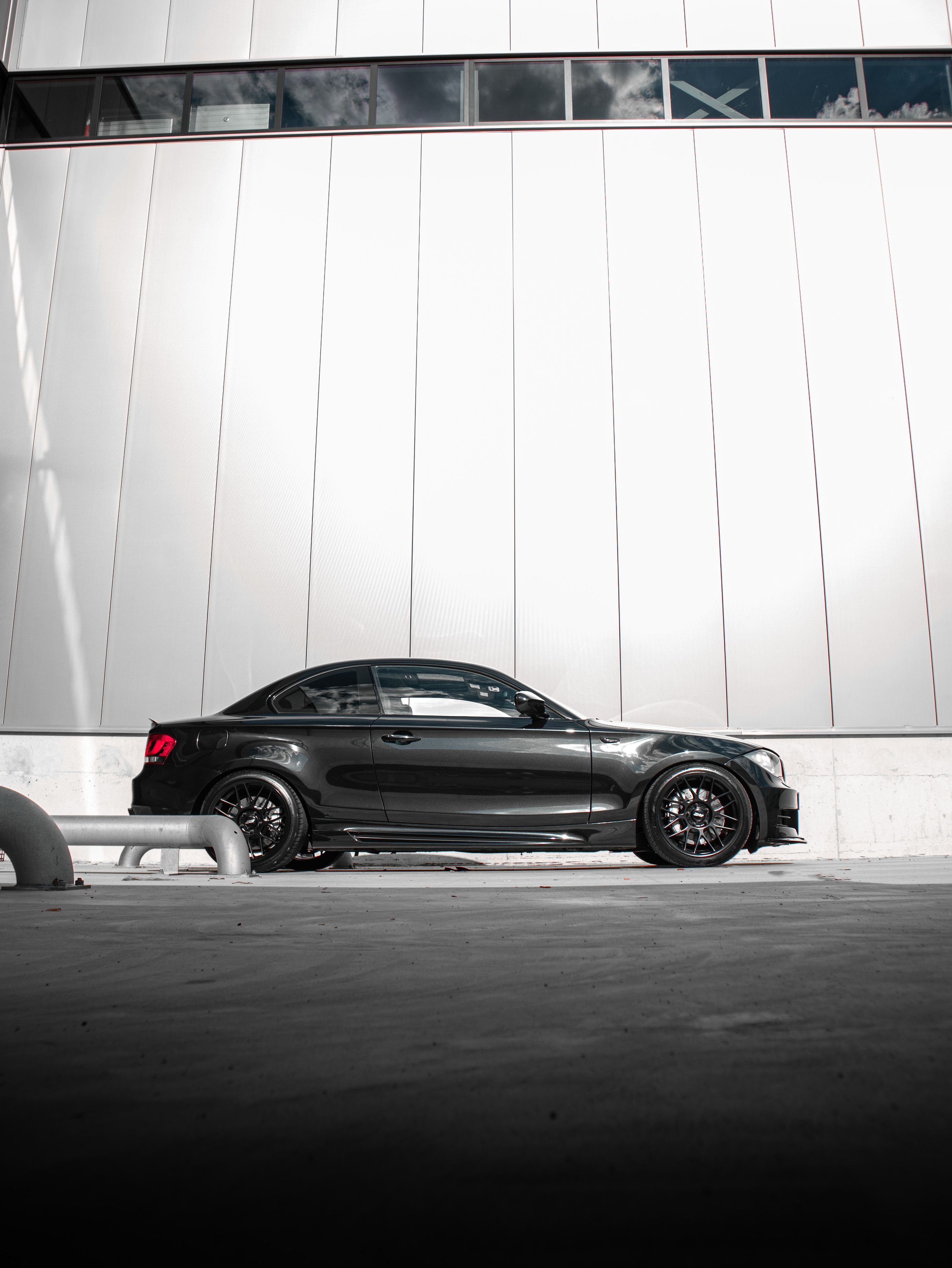 Black BMW E82 Coupe 1 Series with 18" ARC-8 Apex wheels in Satin Black