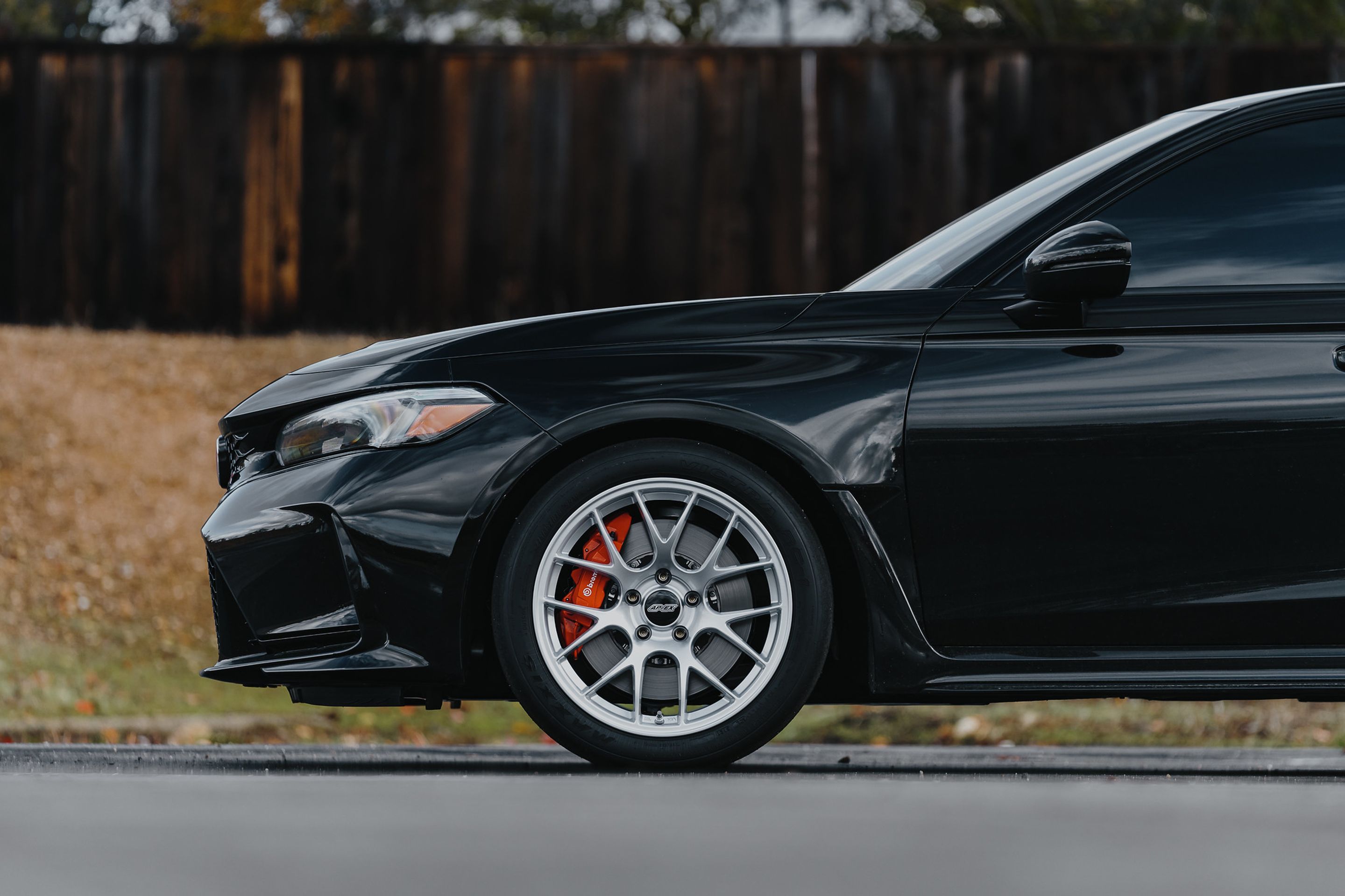 Black Honda FL5 Civic Type-R with 18" EC-7 Apex wheels in Race Silver