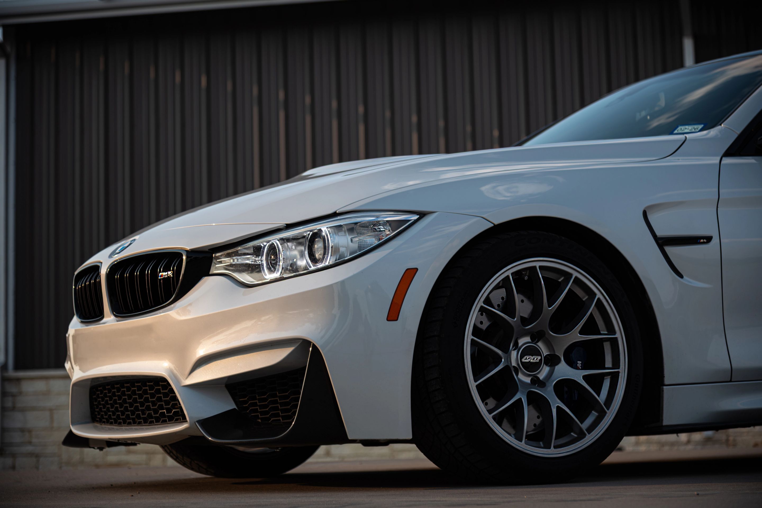 White BMW F82 Coupe M4 with 18" EC-7 Apex wheels in Race Silver