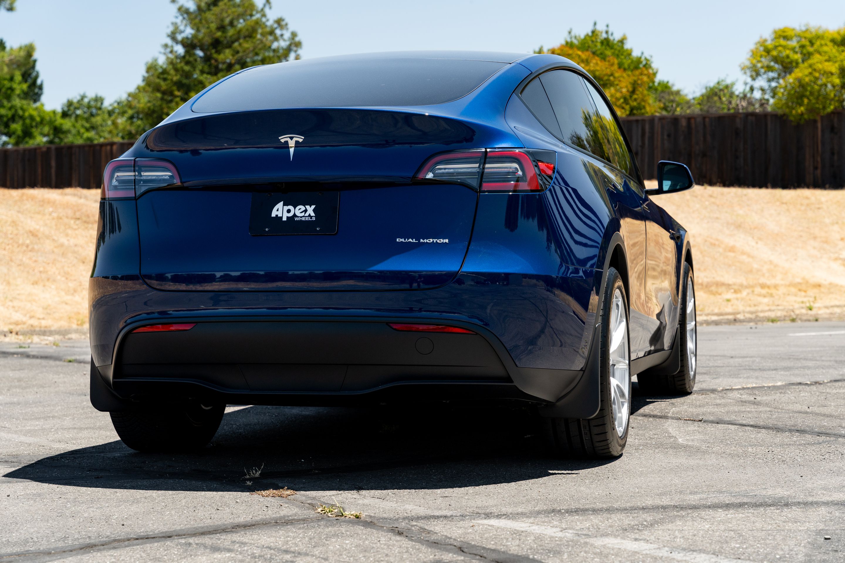 Blue Tesla Model Y RWD/AWD with 20" VS-5RX Apex wheels in Brushed Clear