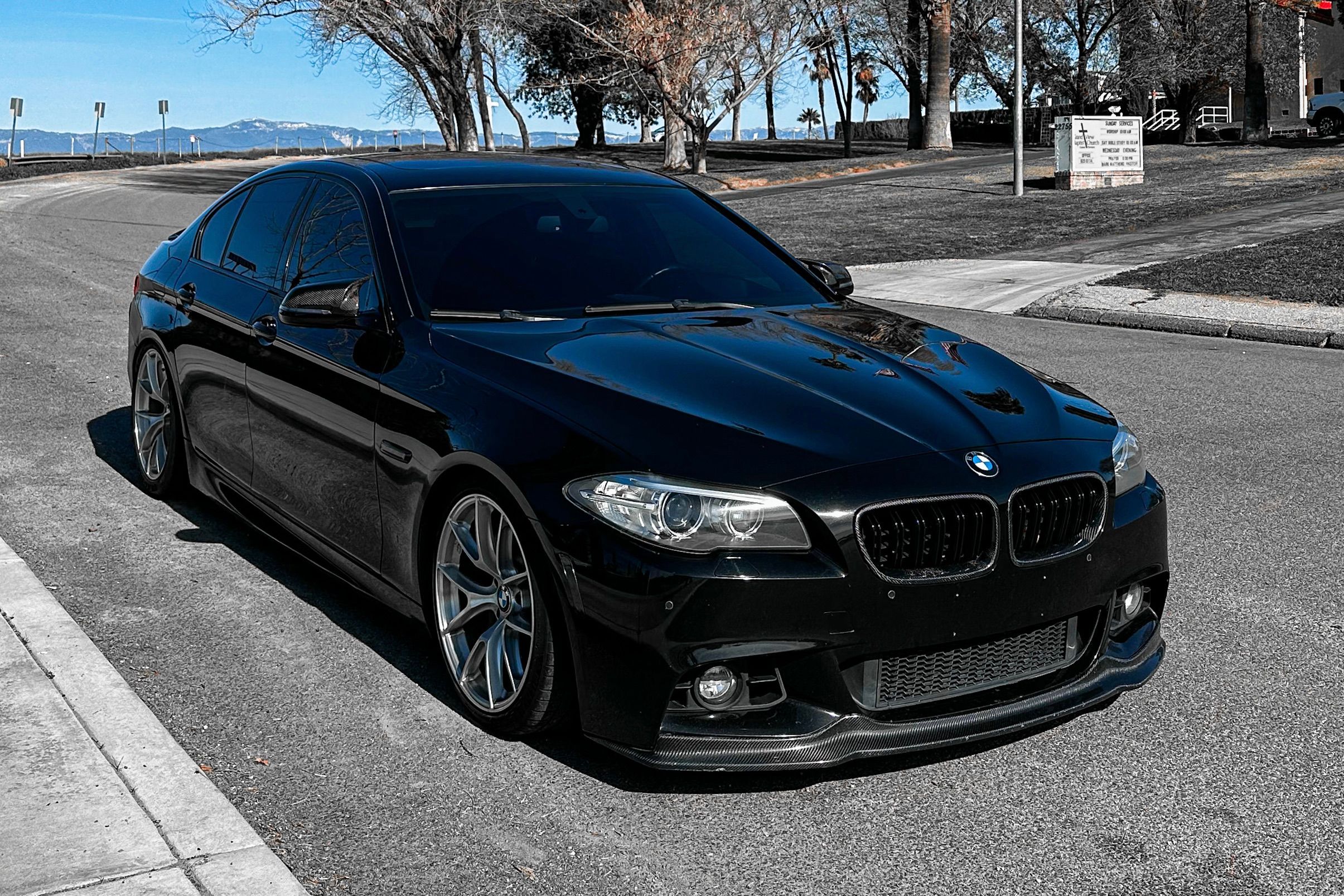 Black BMW F10 Sedan 5 Series with 19" VS-5RS Apex wheels in Brushed Clear