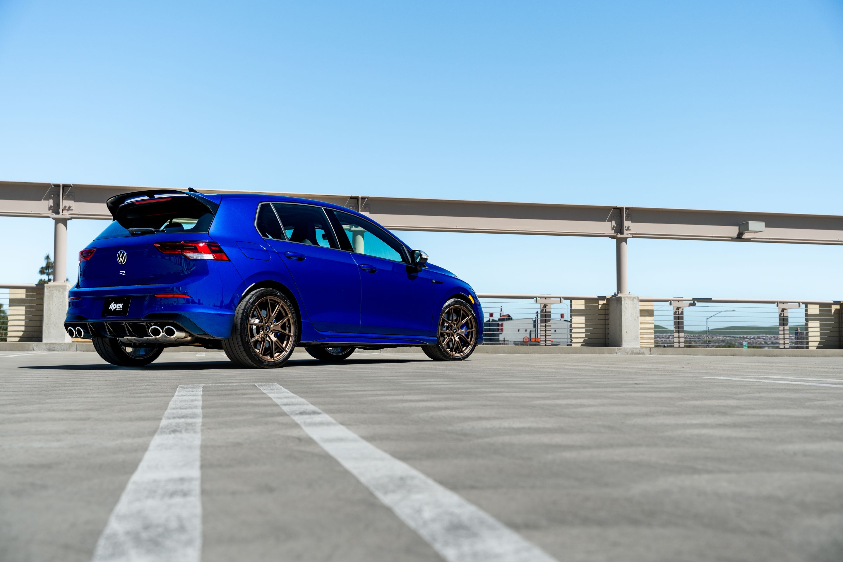 Blue VW MK8 Golf R with 18" VS-5 Apex wheels in Satin Bronze