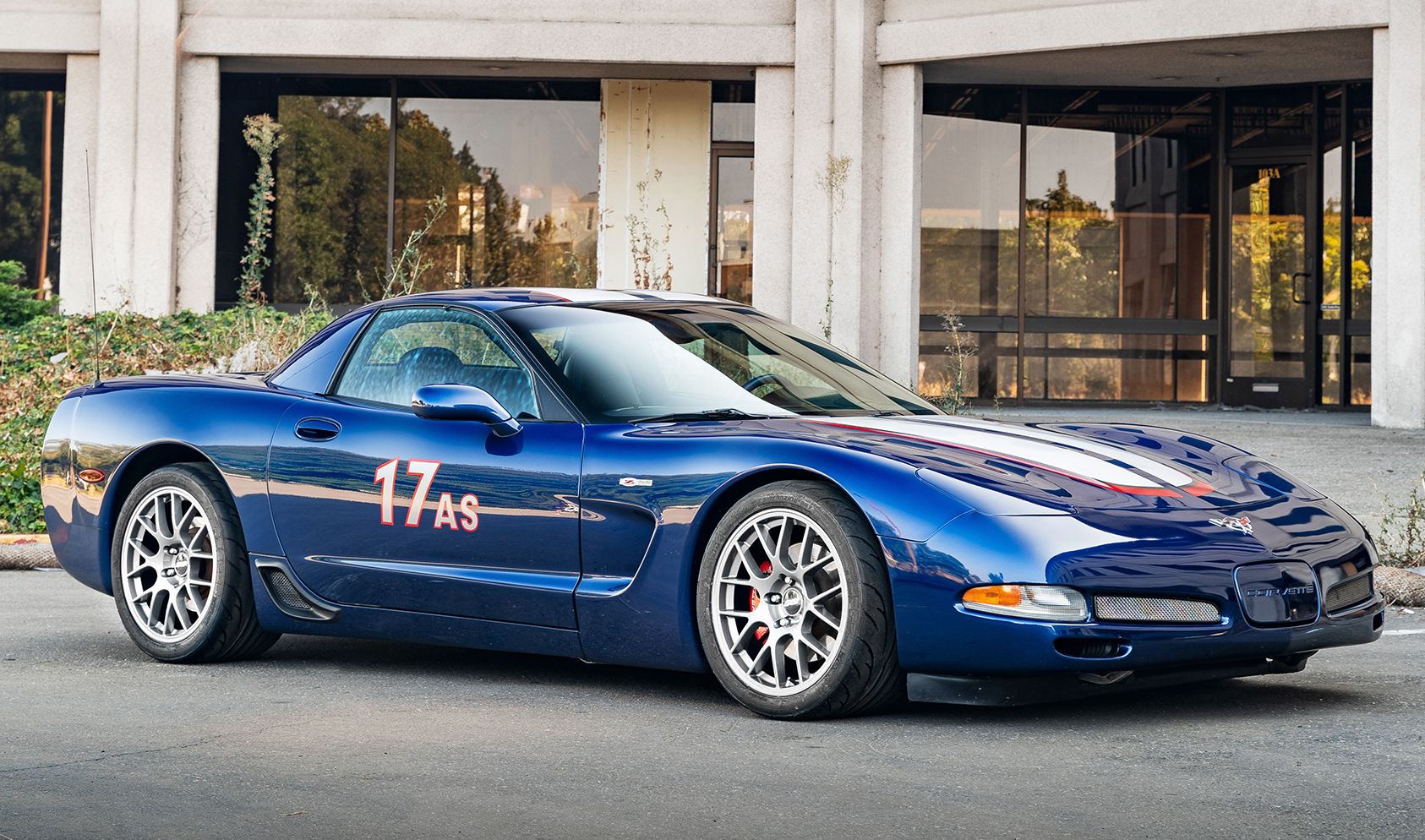 Blue Chevrolet C5 Corvette Z06 with 18" EC-7 Apex wheels in Race Silver