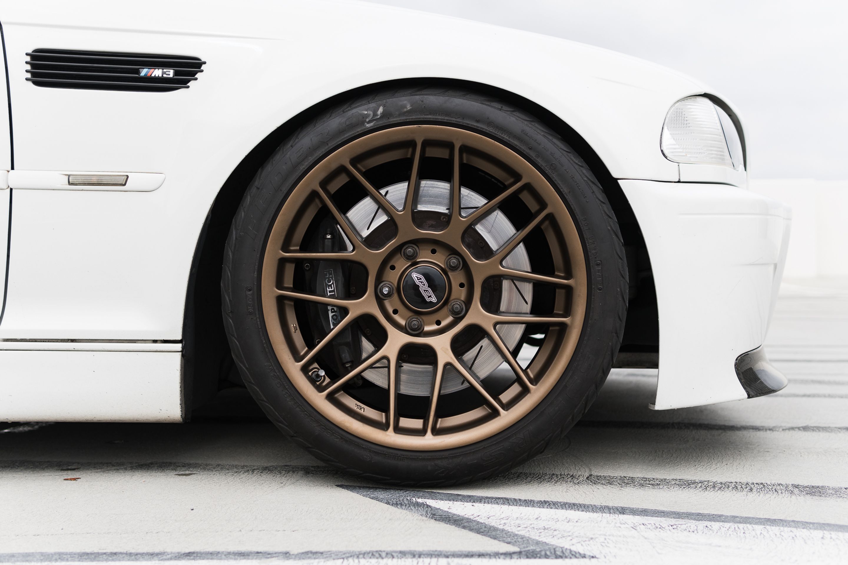 White BMW E46 M3 with 18" ARC-8 Apex wheels in Satin Bronze