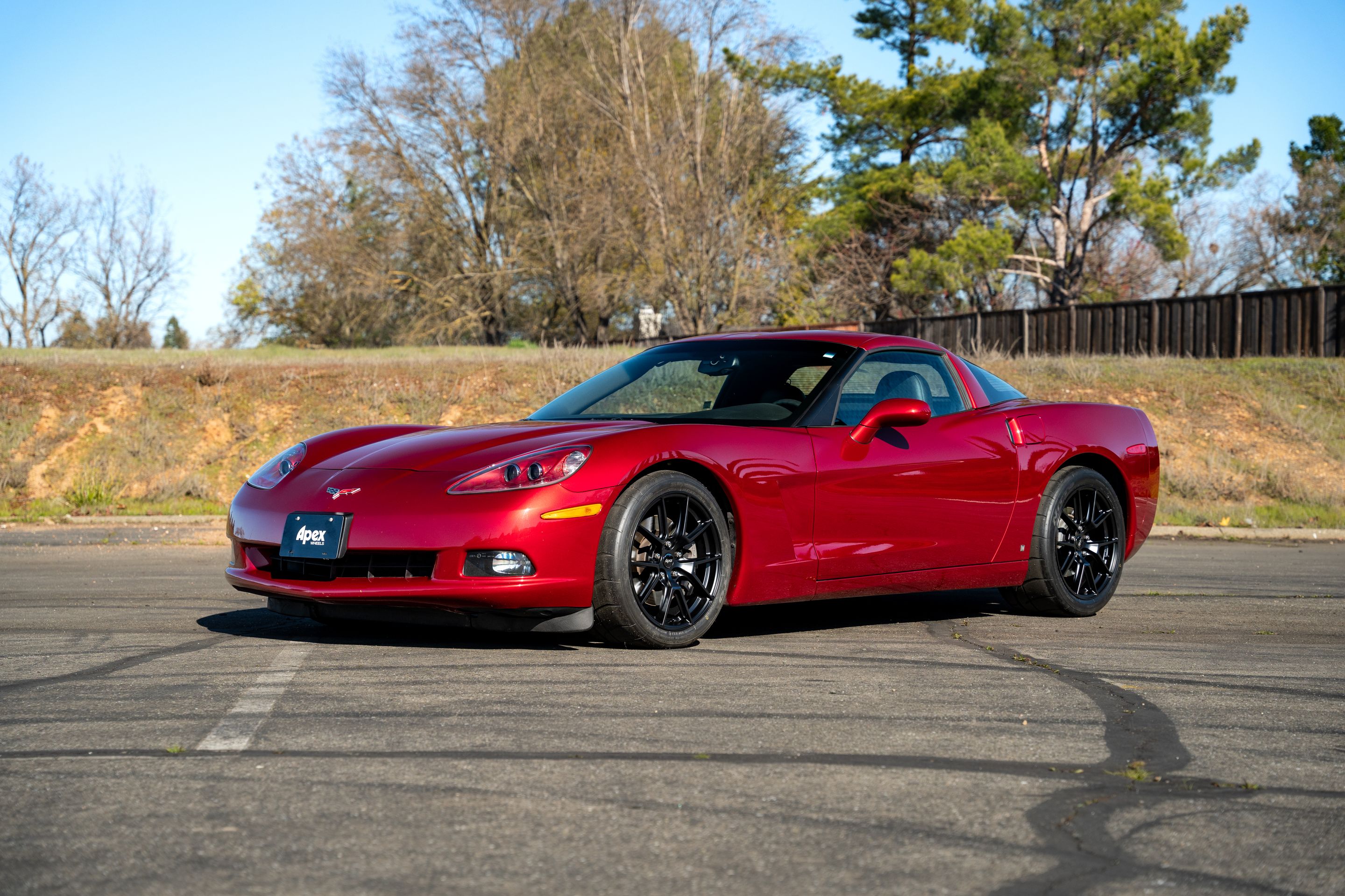 Red Chevrolet C6 Corvette Base/Z51 with 18" VS-5 Apex wheels in Satin Black