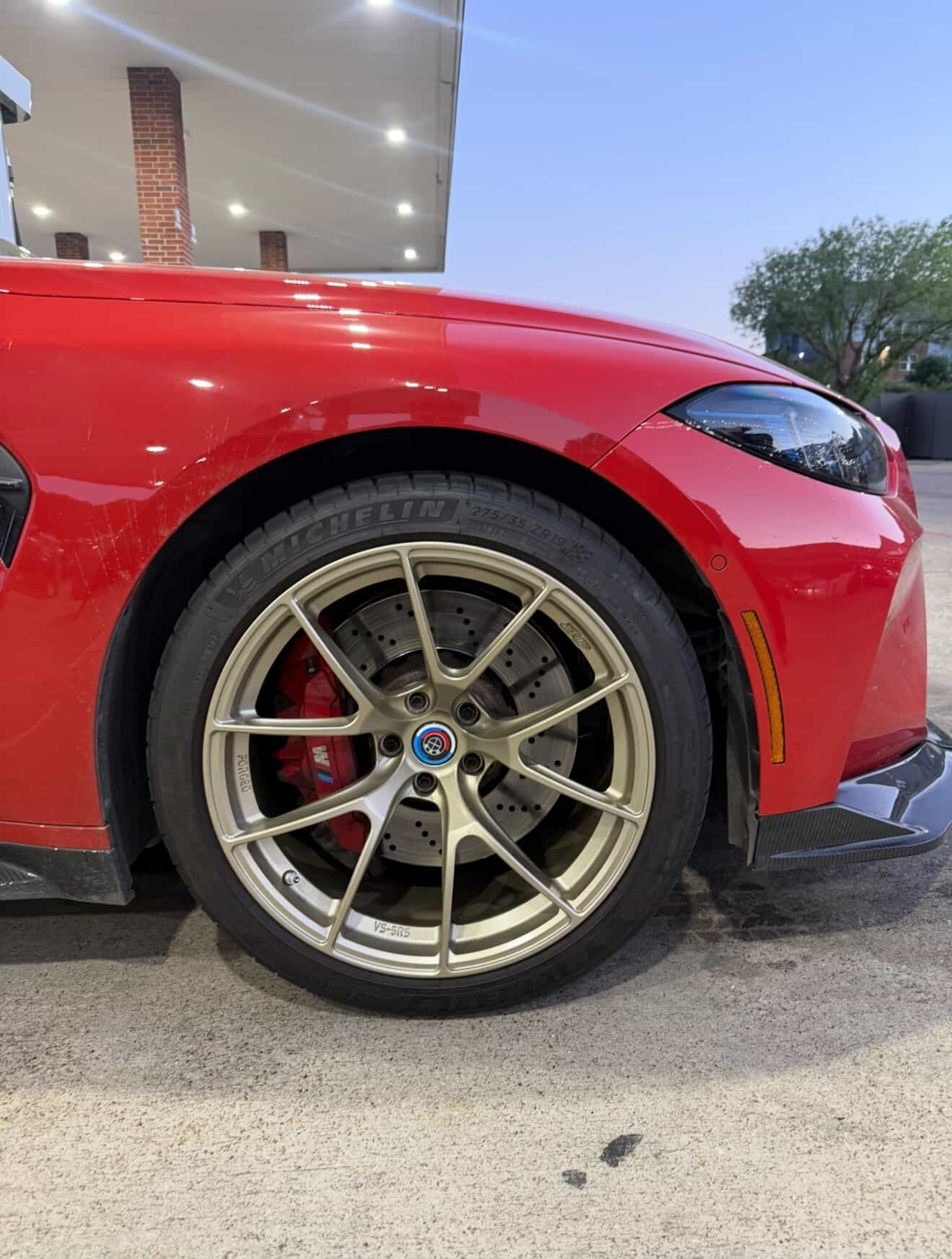 Red BMW G80 M3 with 19" VS-5RS Apex wheels in Motorsport Gold