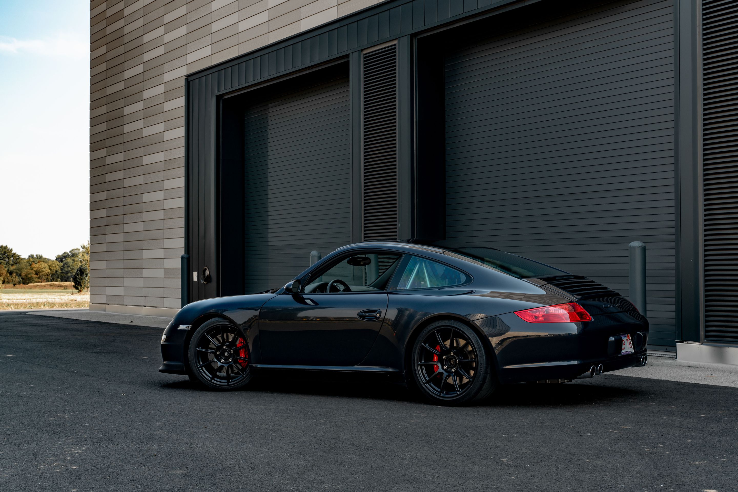 Grey Porsche 911 997 Carrera S with 19" SM-10 Apex wheels in Satin Black
