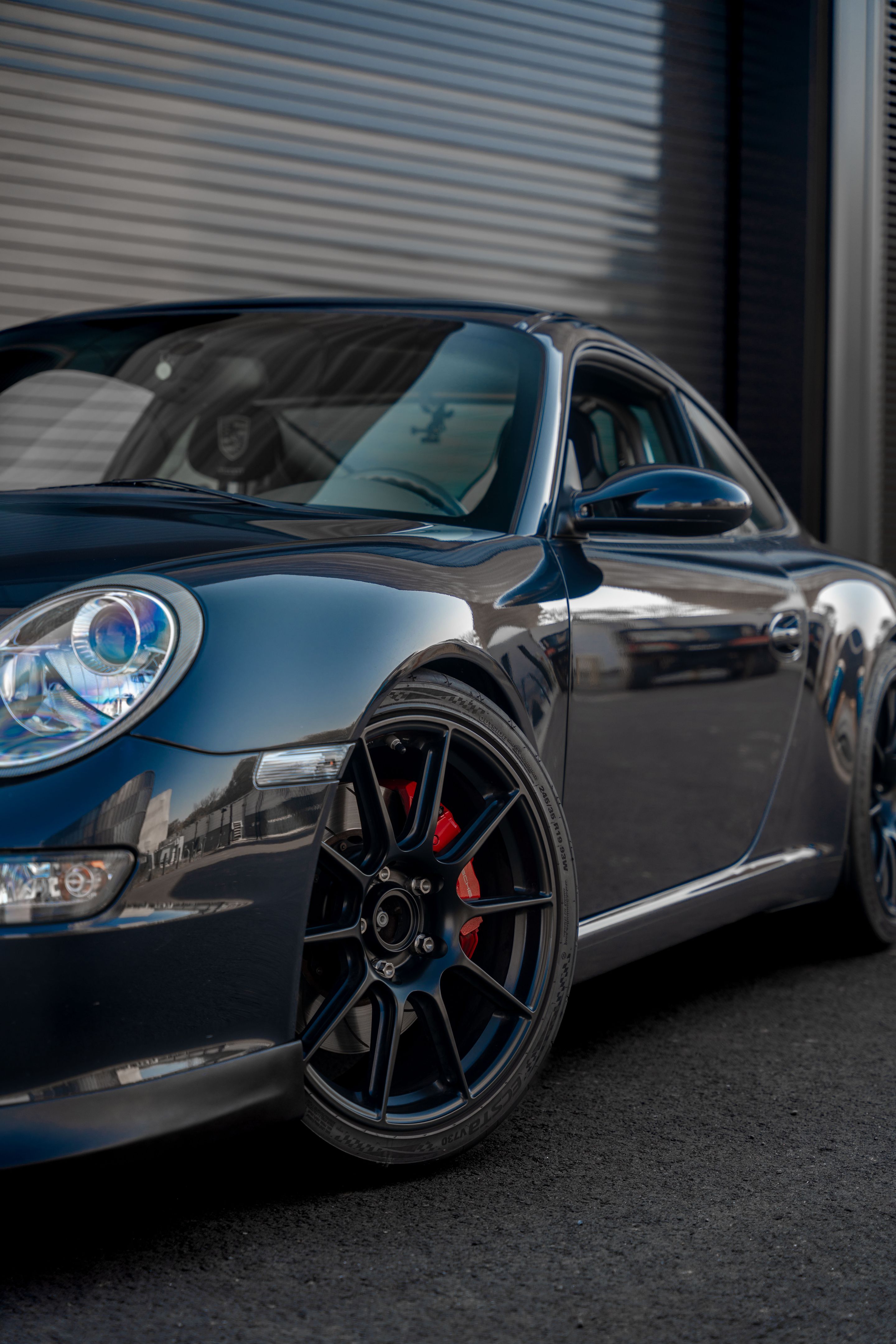 Grey Porsche 911 997 Carrera S with 19" SM-10 Apex wheels in Satin Black