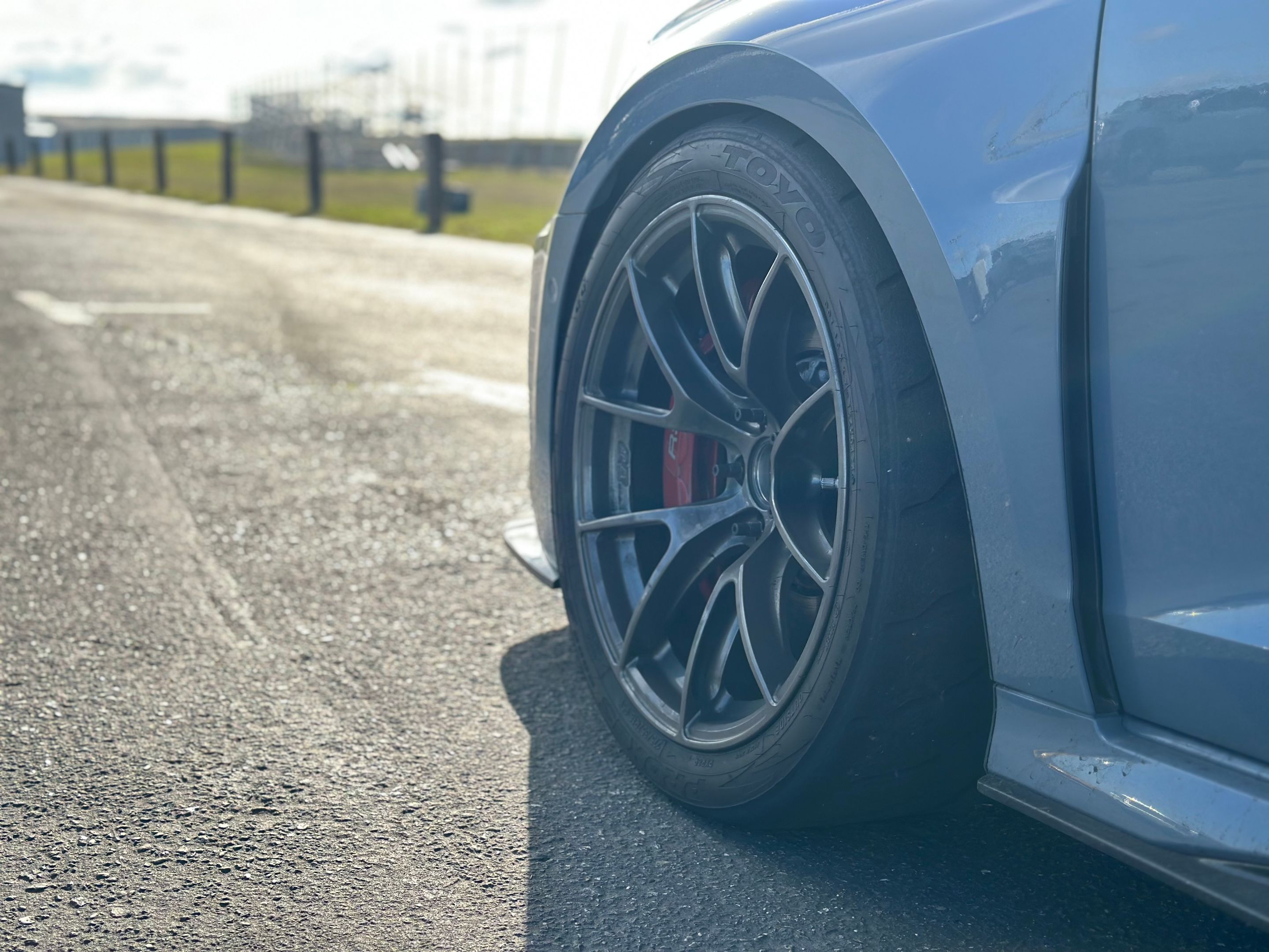 Blue Audi 8Y RS 3 with 18" VS-5RS Apex wheels in Anthracite