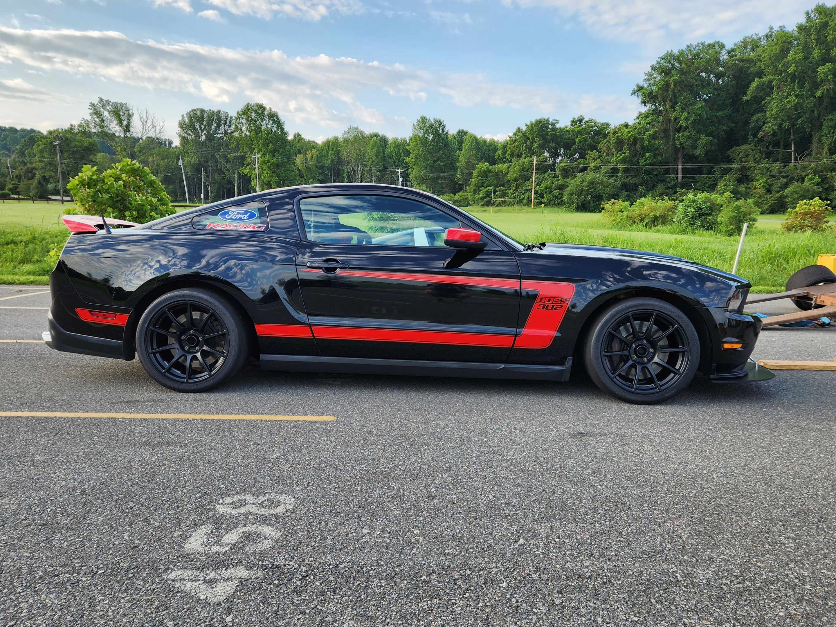 Black Ford S197 Mustang Boss 302 with 18" SM-10 Apex wheels in Satin Black