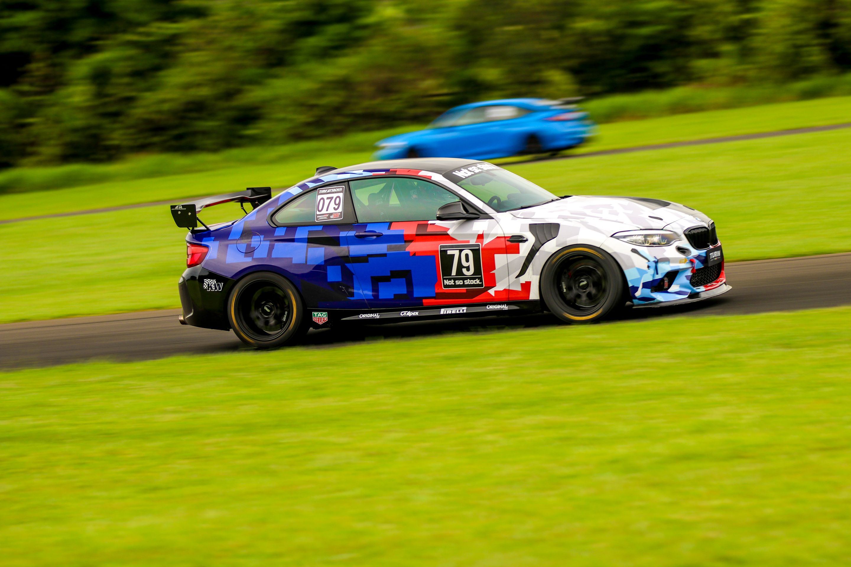 Multicolor BMW F87 M2 with 18" EC-7 Apex wheels in Satin Black