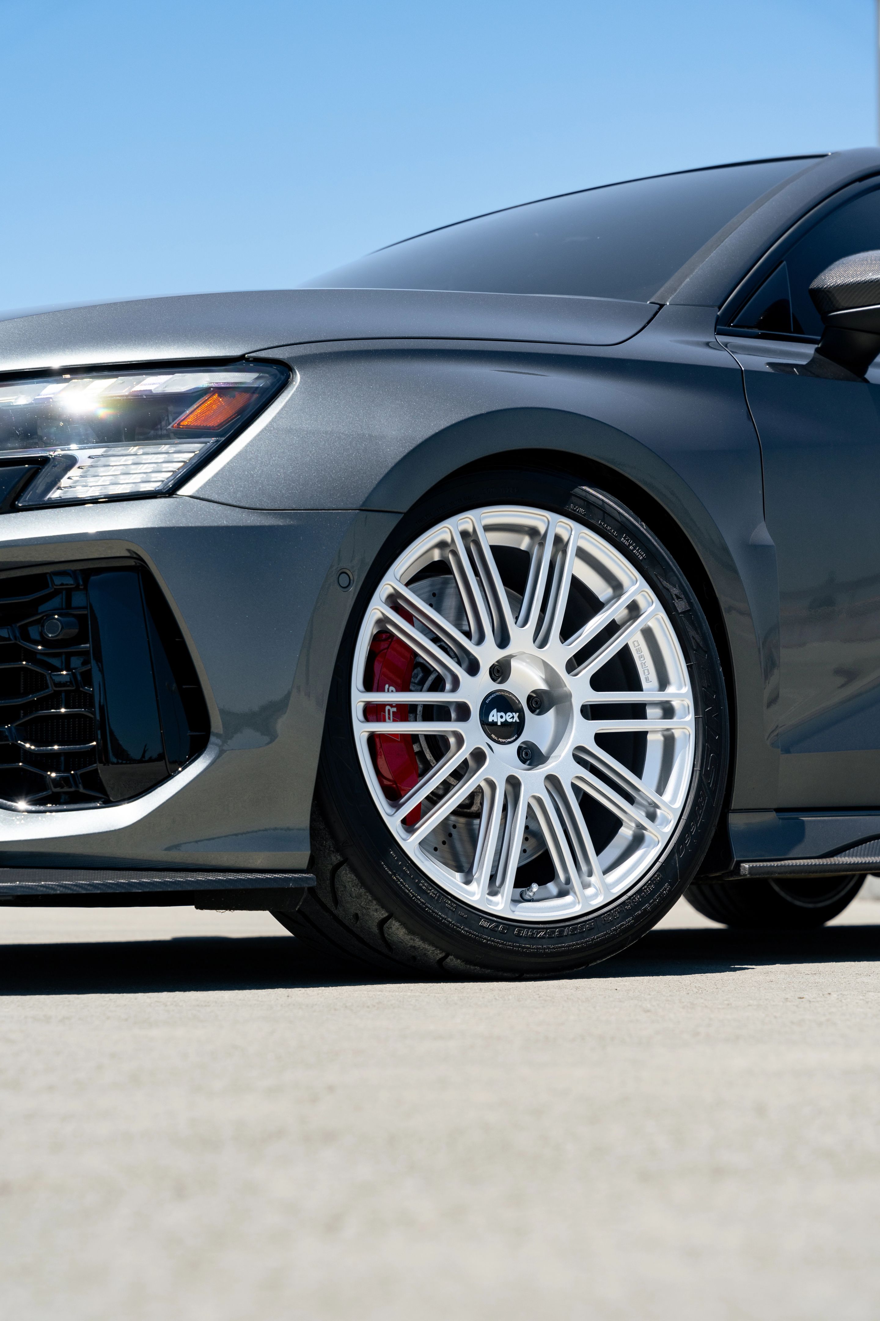 Grey Audi 8Y RS 3 with 18" TC-10RT Apex wheels in Race Silver