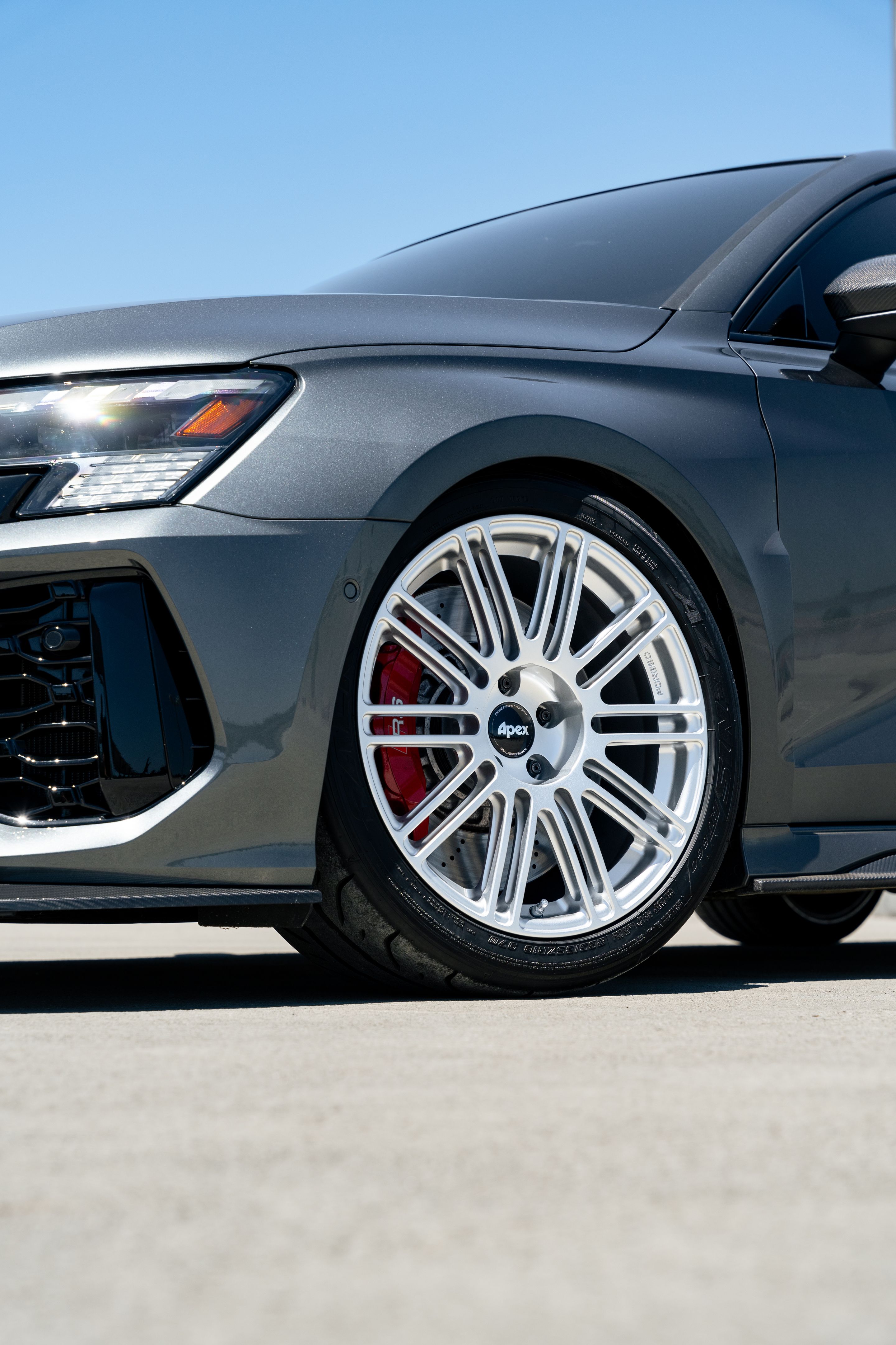 Grey Audi 8Y RS 3 with 18" TC-10RT Apex wheels in Race Silver