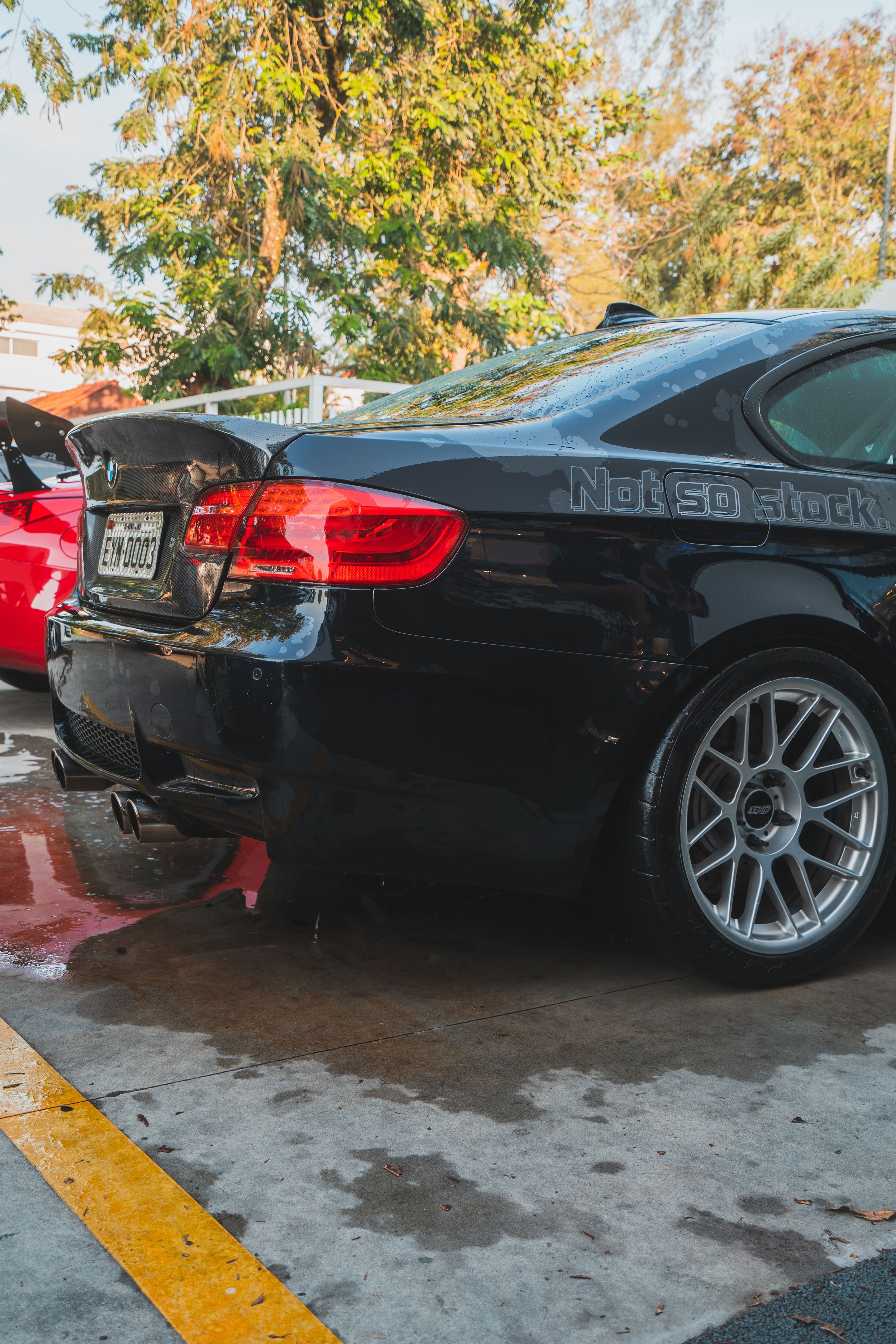 Black BMW E92 Coupe M3 with 18" ARC-8 Apex wheels in Hyper Silver