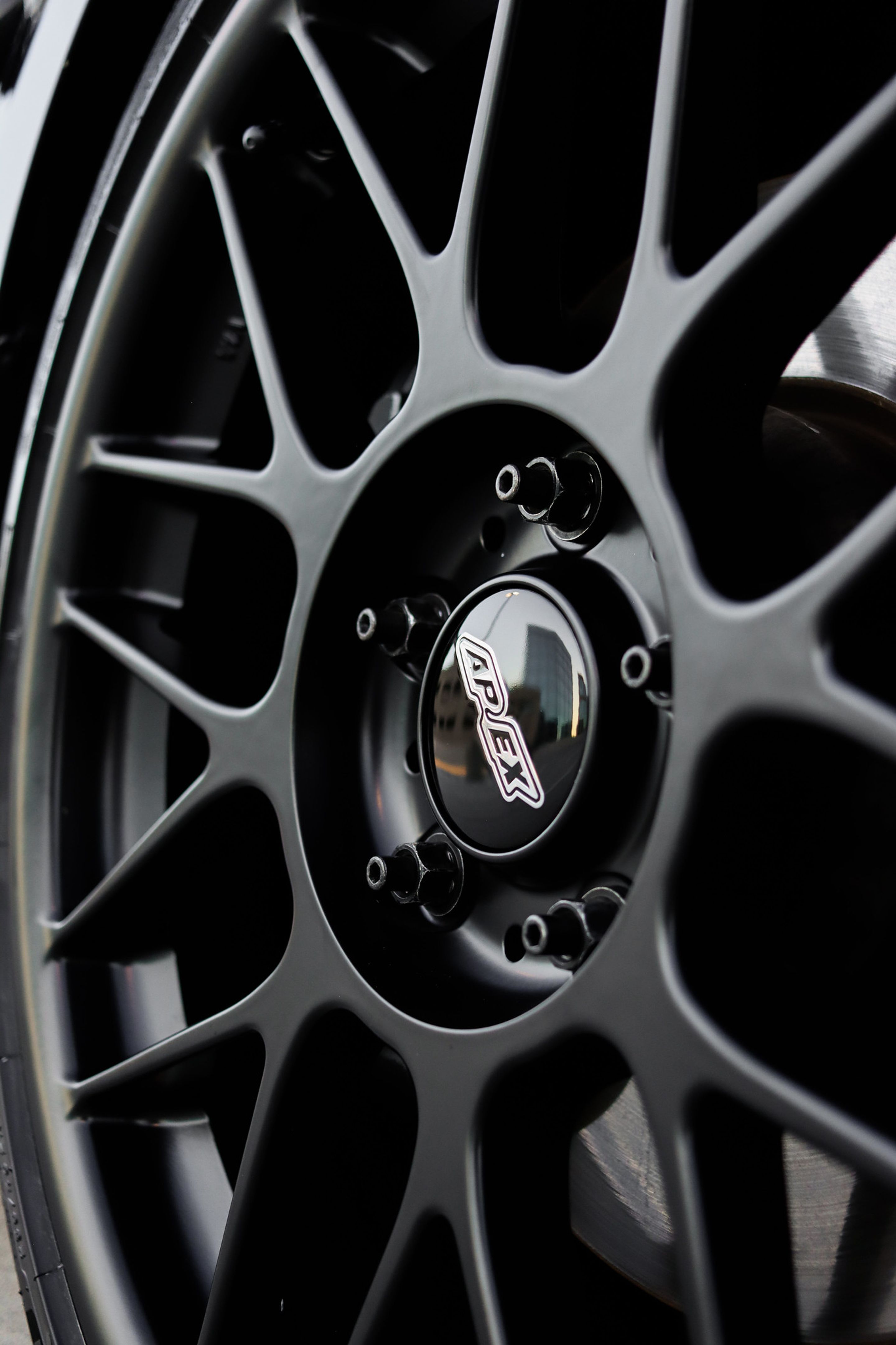 Black BMW E82 Coupe 1 Series with 18" ARC-8 Apex wheels in Satin Black