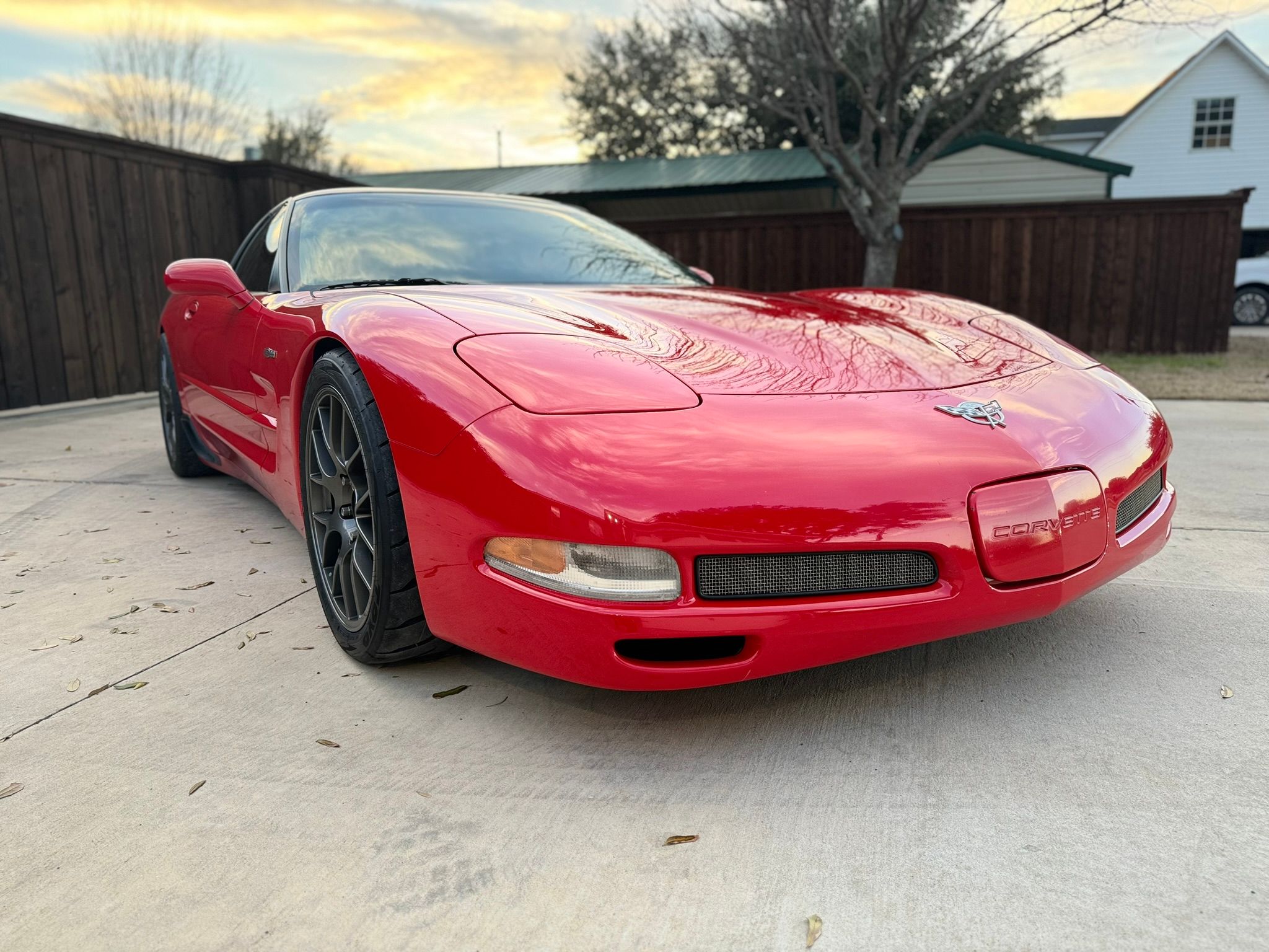 Red Chevrolet C5 Corvette Z06 with 18" EC-7 Apex wheels in Anthracite