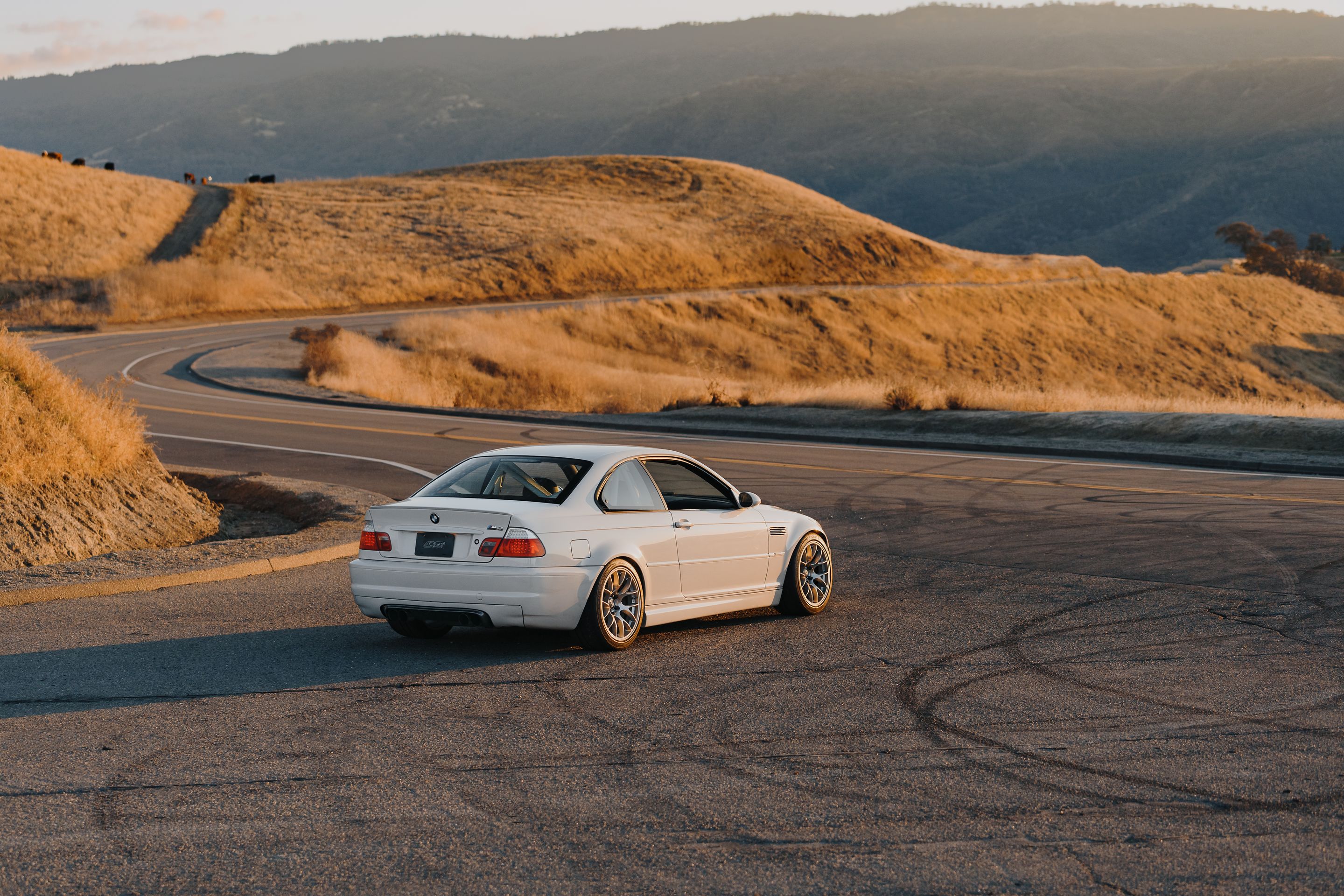 White BMW E46 M3 with 18" EC-7 Apex wheels in Race Silver