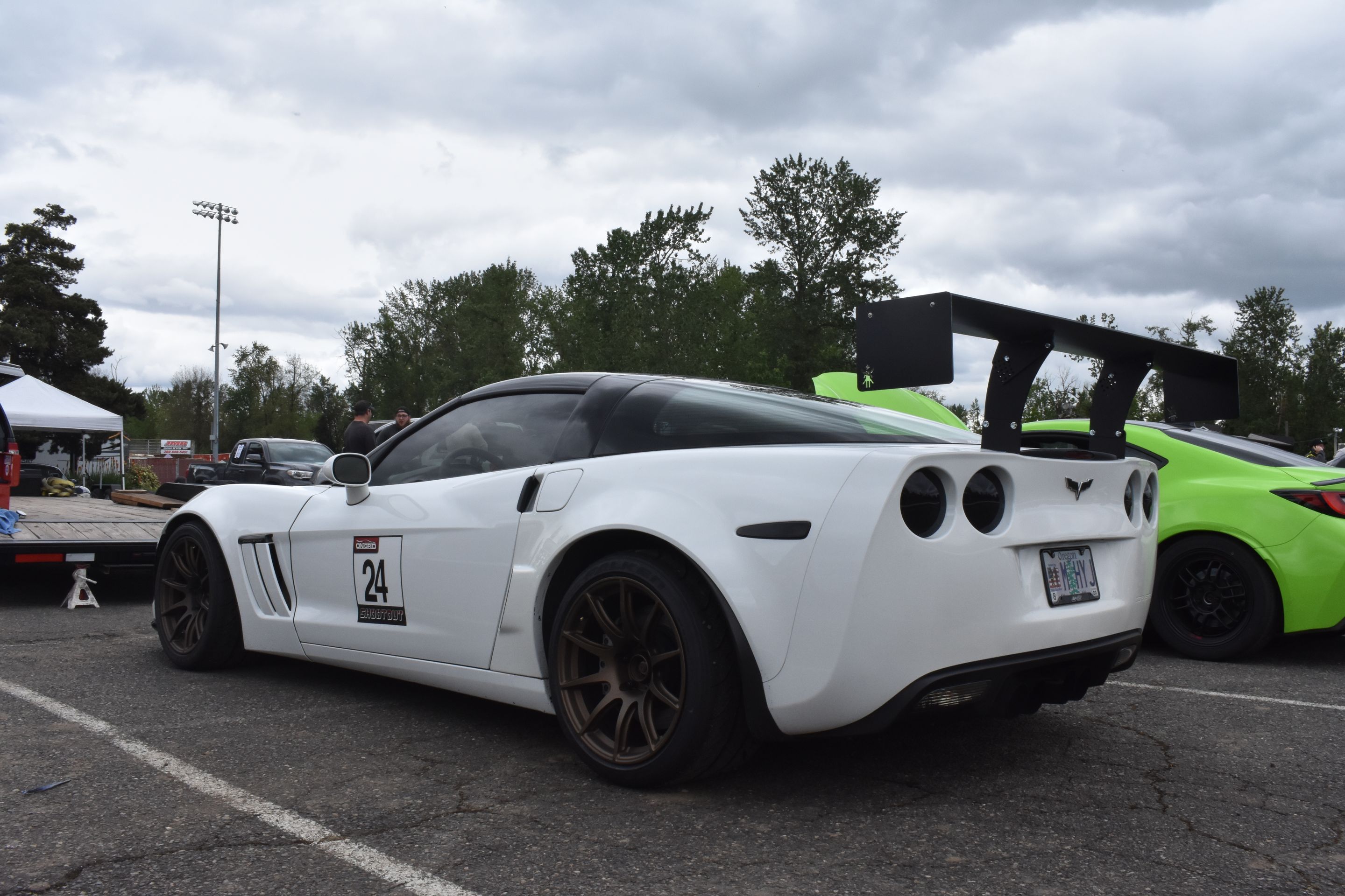 White Chevrolet C6 Corvette Grand Sport with 18" SM-10 Apex wheels in Satin Bronze