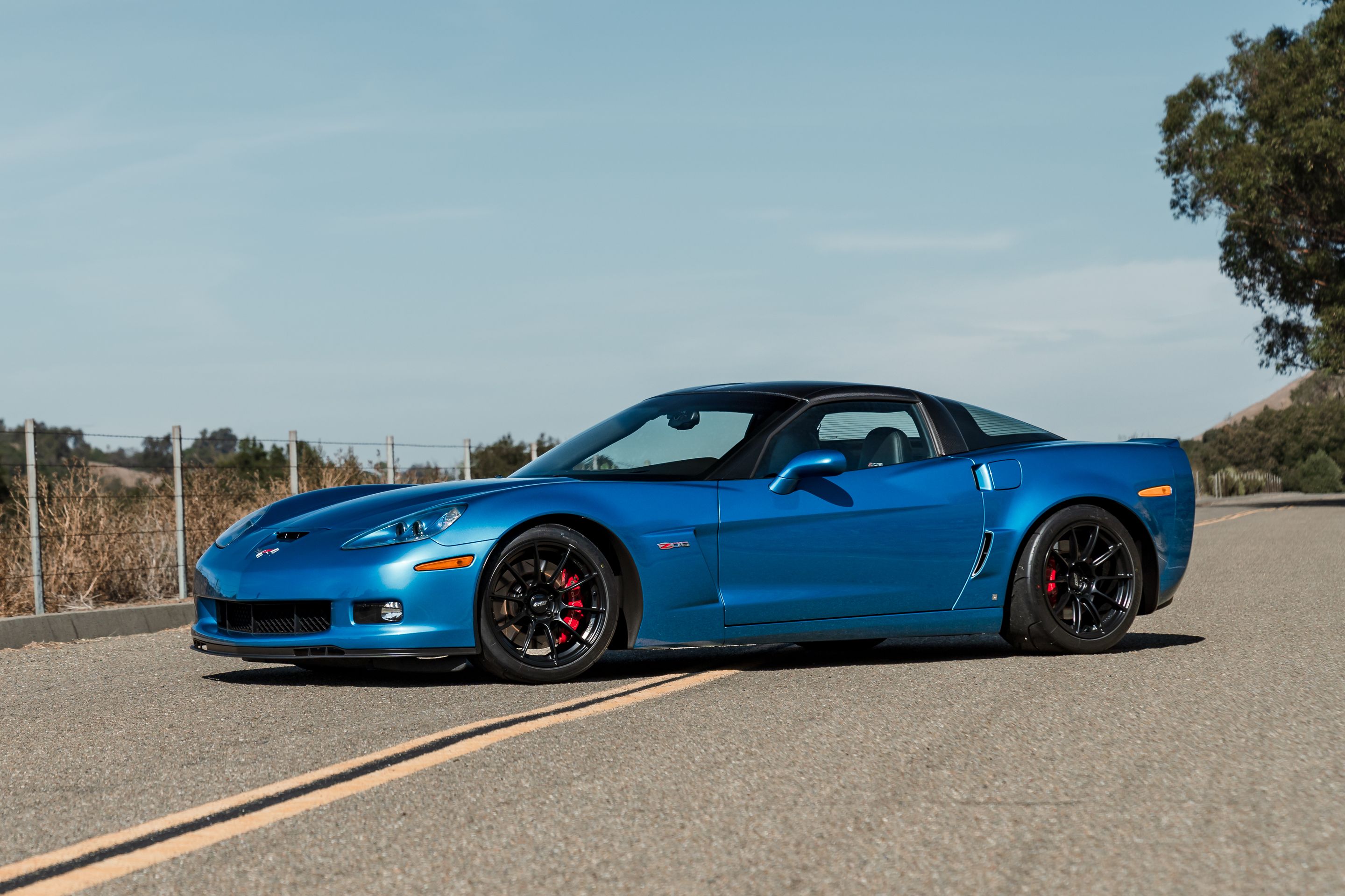 Blue Chevrolet C6 Corvette Z06 with 18" SM-10RS Apex wheels in Satin Black