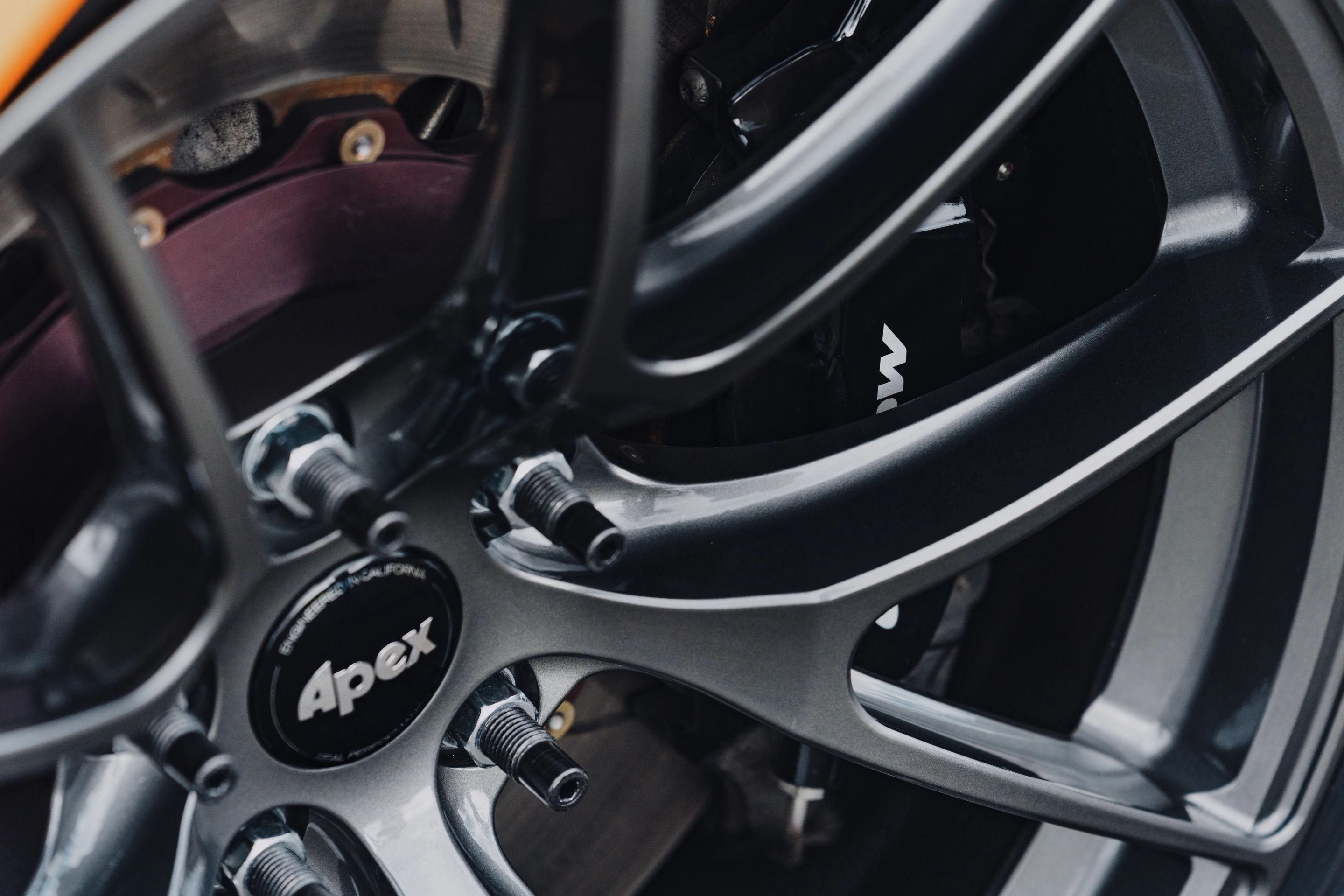 Orange McLaren 720S with 19"/20" VS-5RS Apex wheels in Anthracite