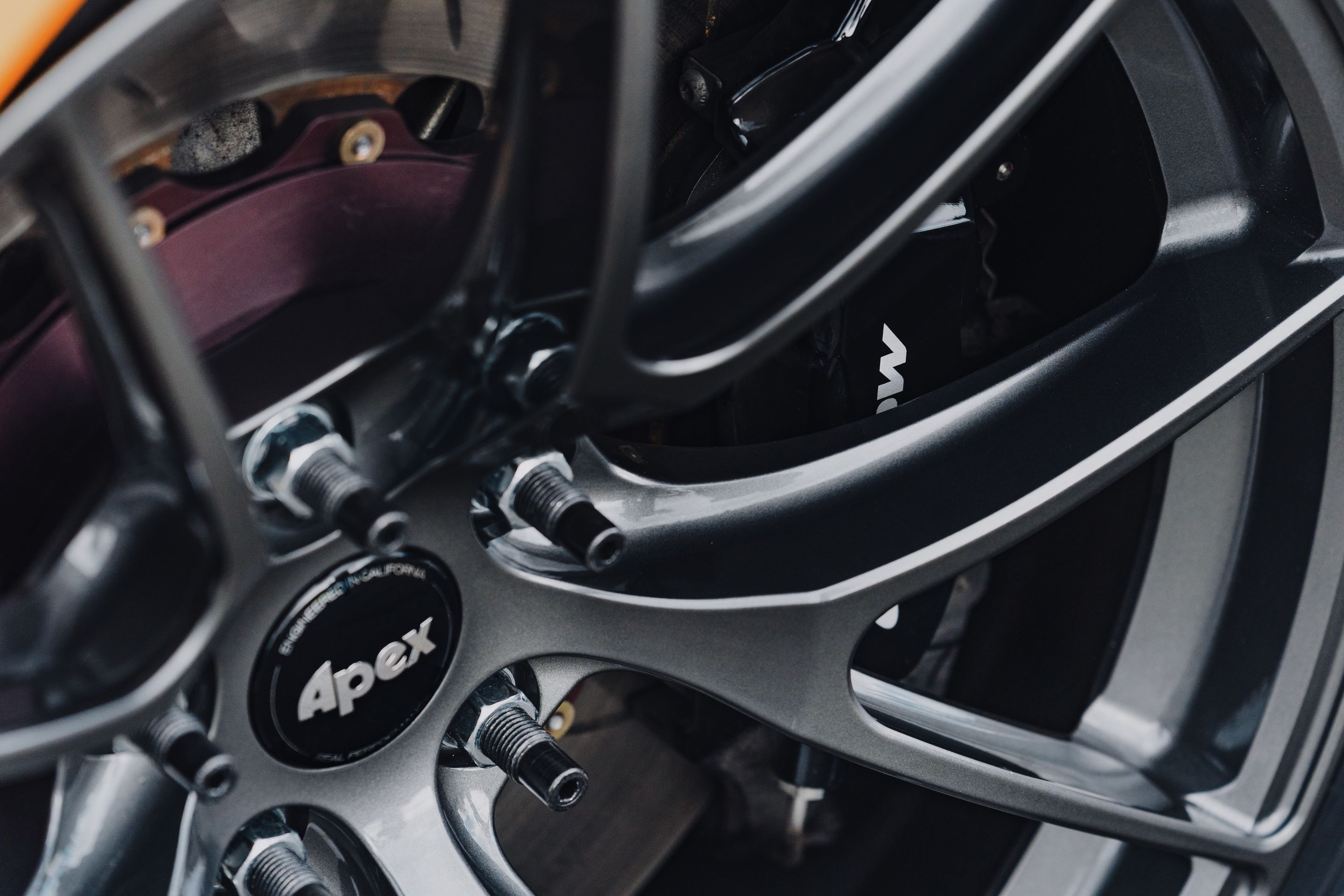 Orange McLaren 720S with 19"/20" VS-5RS Apex wheels in Anthracite