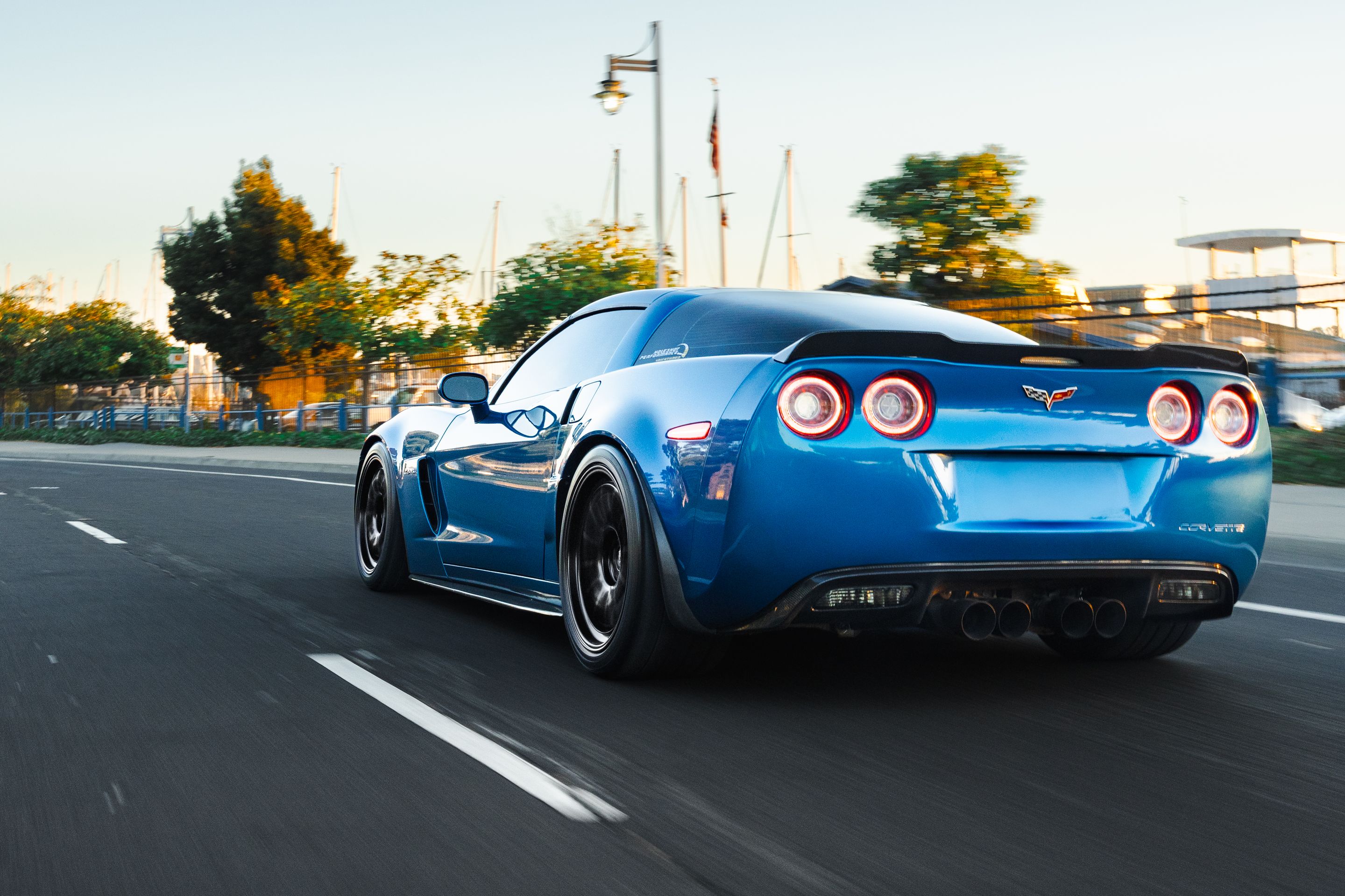 Blue Chevrolet C6 Corvette Z06 with 18"/19" TEST-S Apex wheels in Satin Black