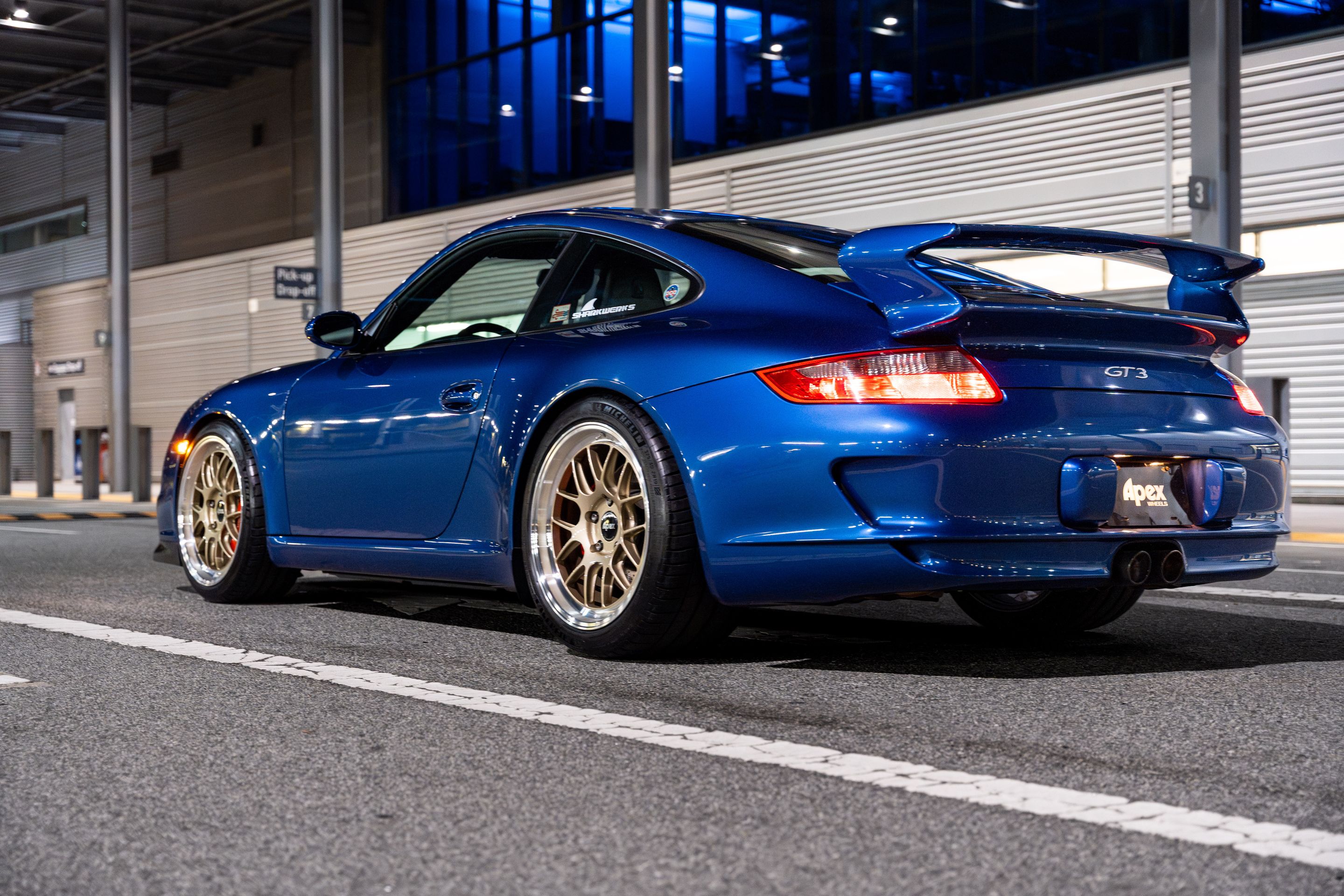 Blue Porsche 911 997 GT3 with 19" TEST-M Apex wheels in Machined Lip Gloss Motorsport Gold