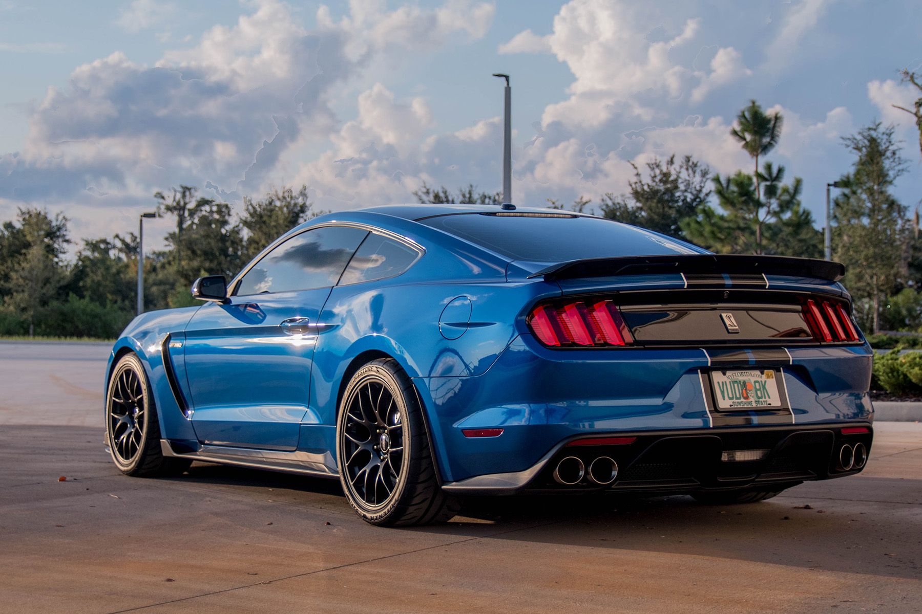 Blue Ford S550 Mustang GT350 with 19" EC-7 Apex wheels in Satin Black
