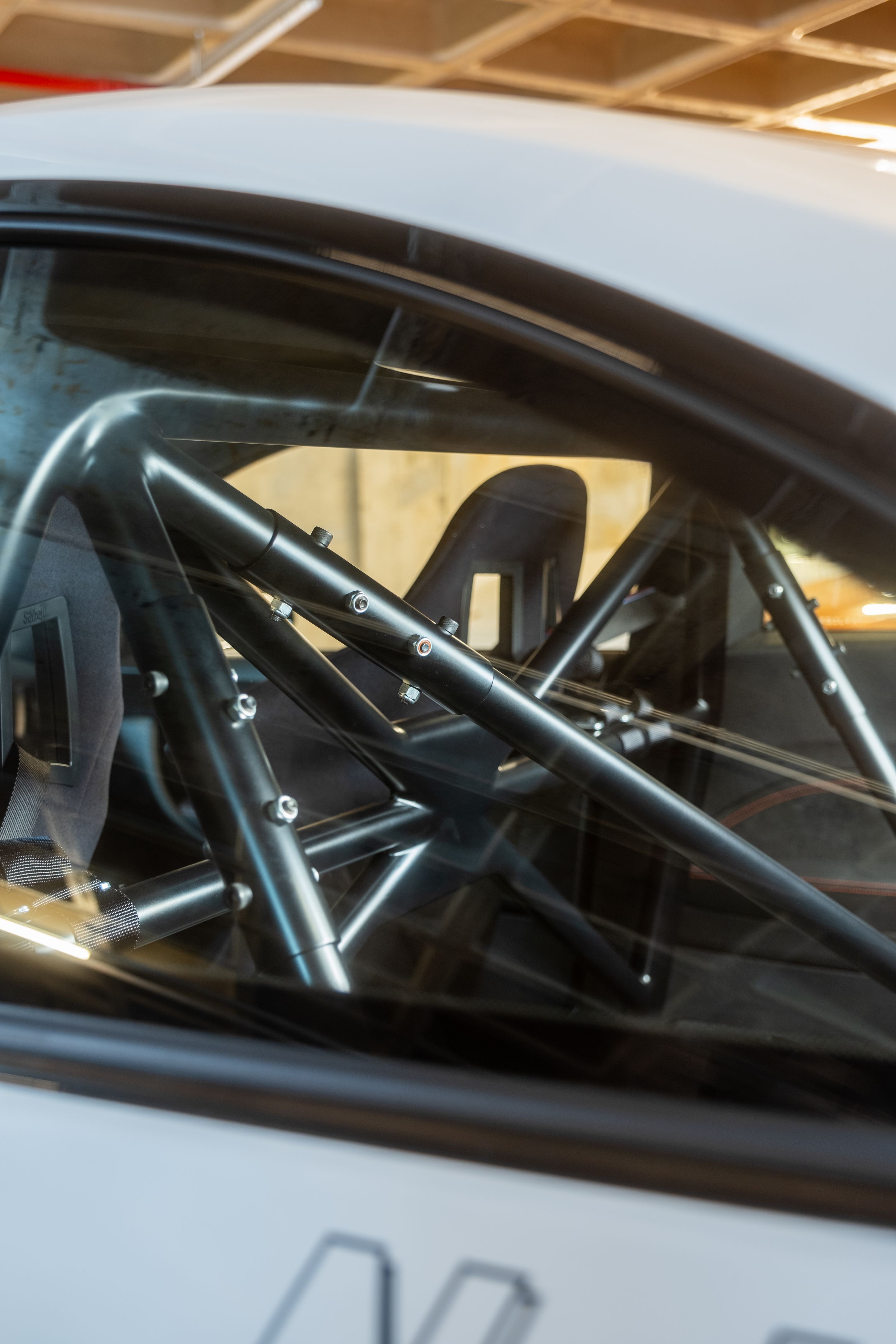 White BMW F87 M2 with 18" EC-7 Apex wheels in Satin Black