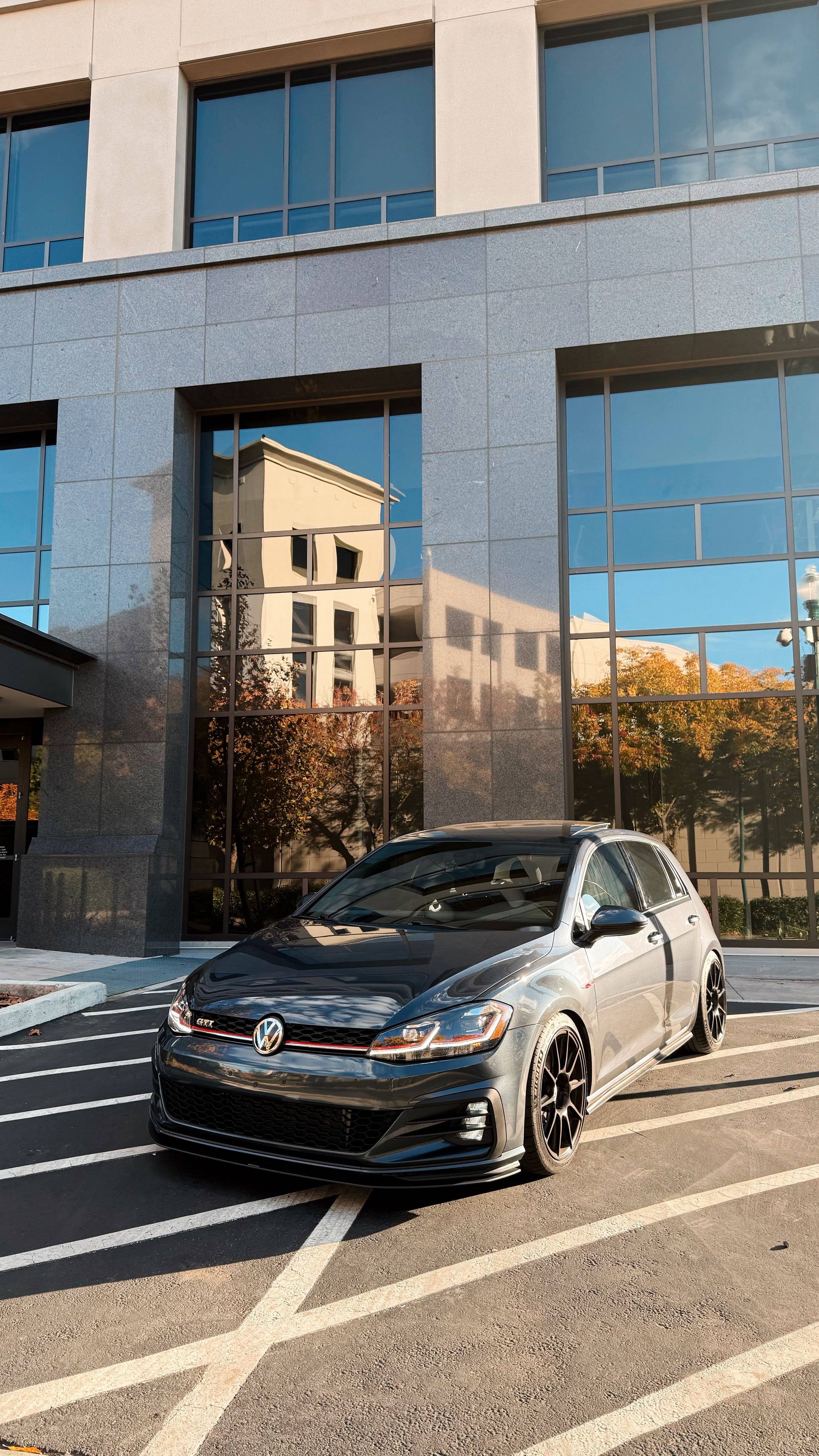 Grey VW MK7 GTI with 18" SM-10 Apex wheels in Satin Black