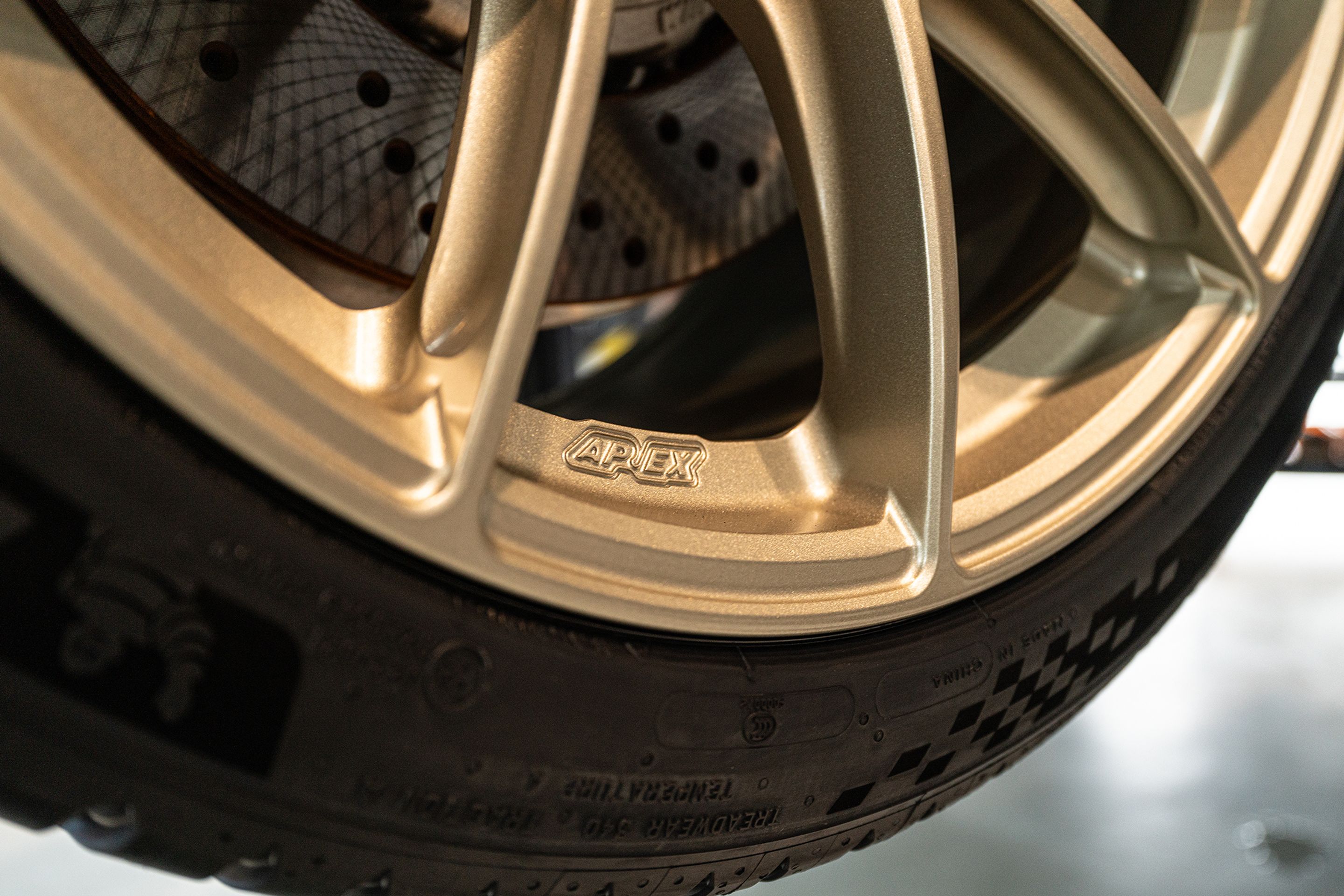 Black BMW G87 M2 with 19" VS-5RS Apex wheels in Motorsport Gold