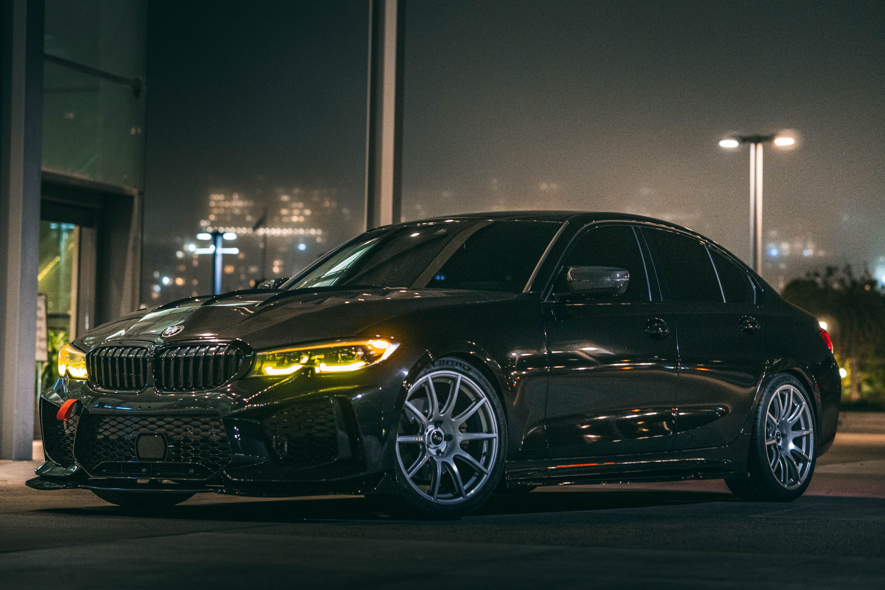 Black BMW G20 Sedan 3 Series with 19" SM-10 Apex wheels in Race Silver