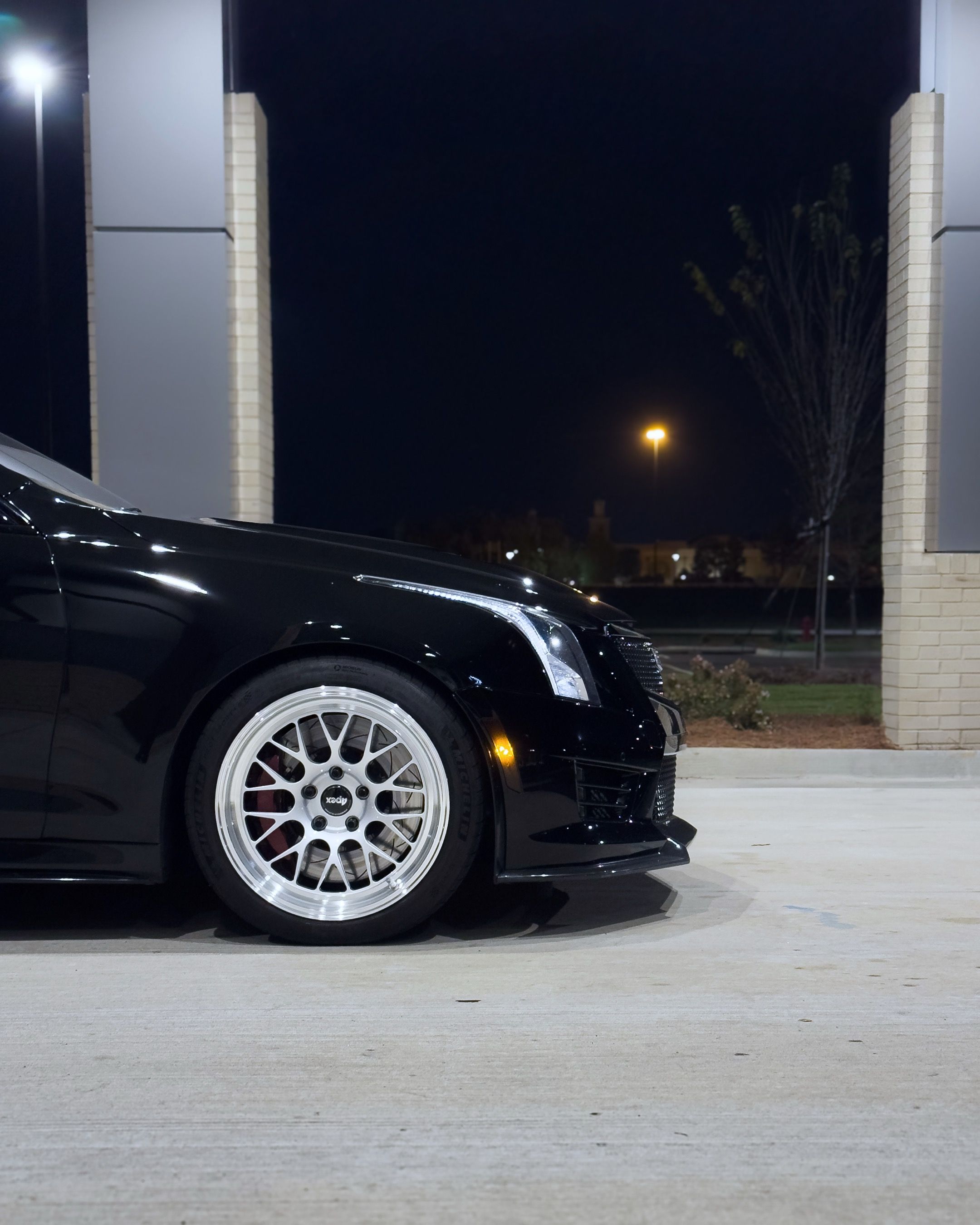 Black Cadillac ATS-V with 18" ML-10RT Apex wheels in Machined Lip Race Silver