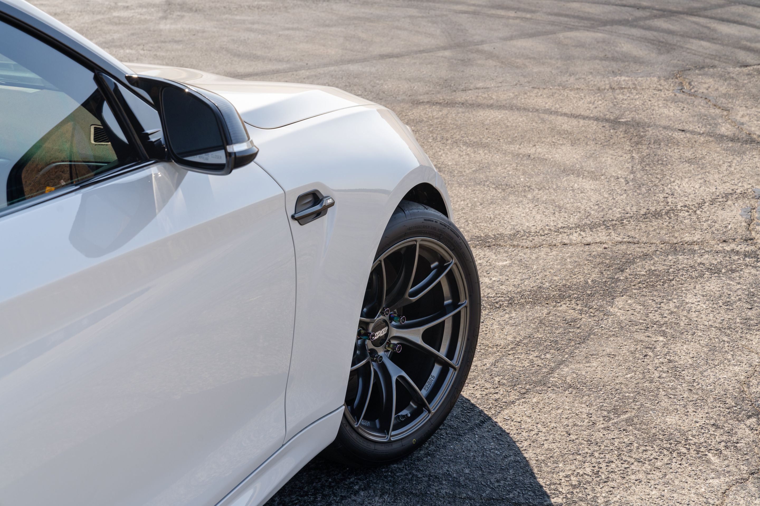 White BMW F87 M2 with 18" VS-5RS Apex wheels in Anthracite