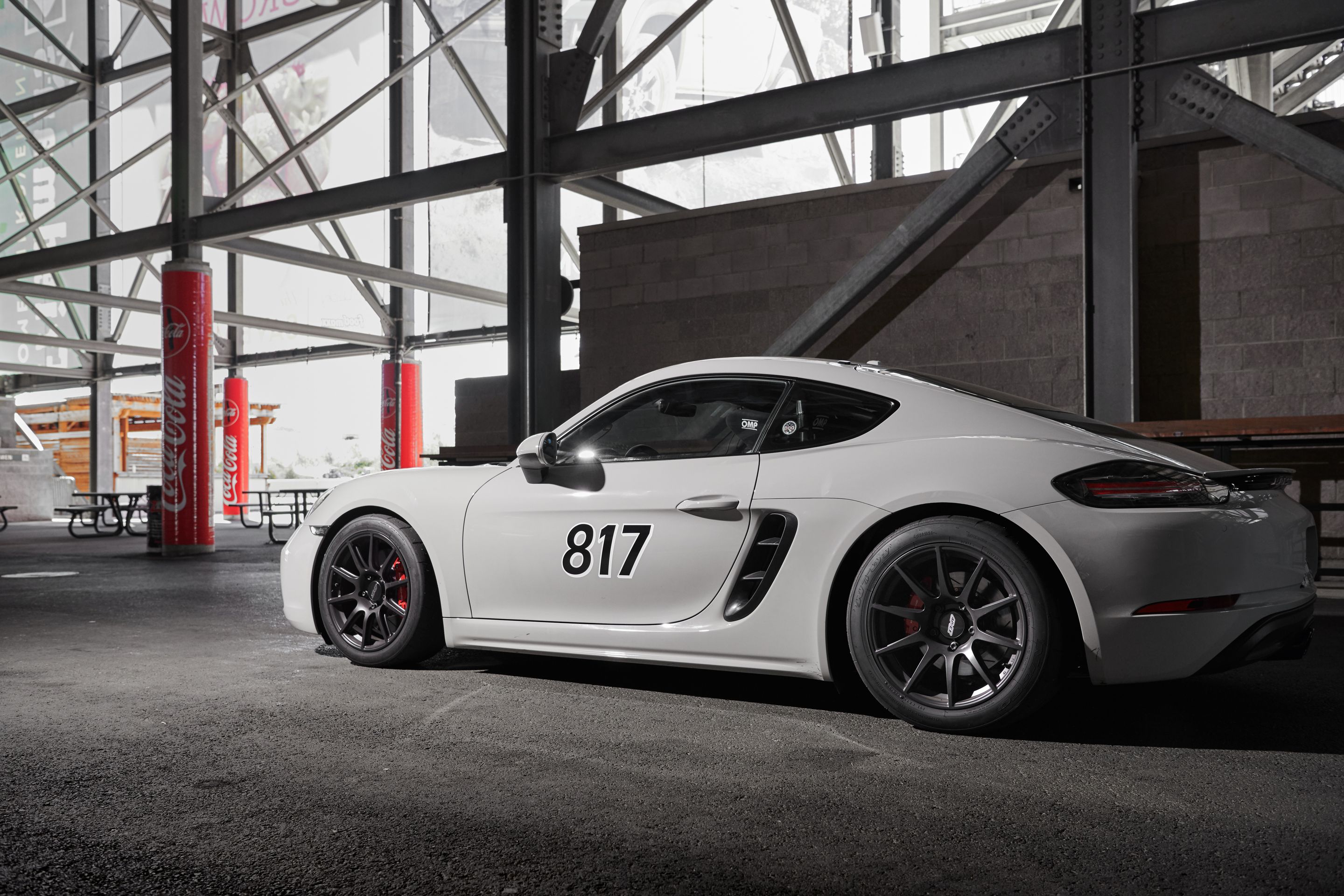 White Porsche 718 Cayman S with 18" SM-10 Apex wheels in Satin Black