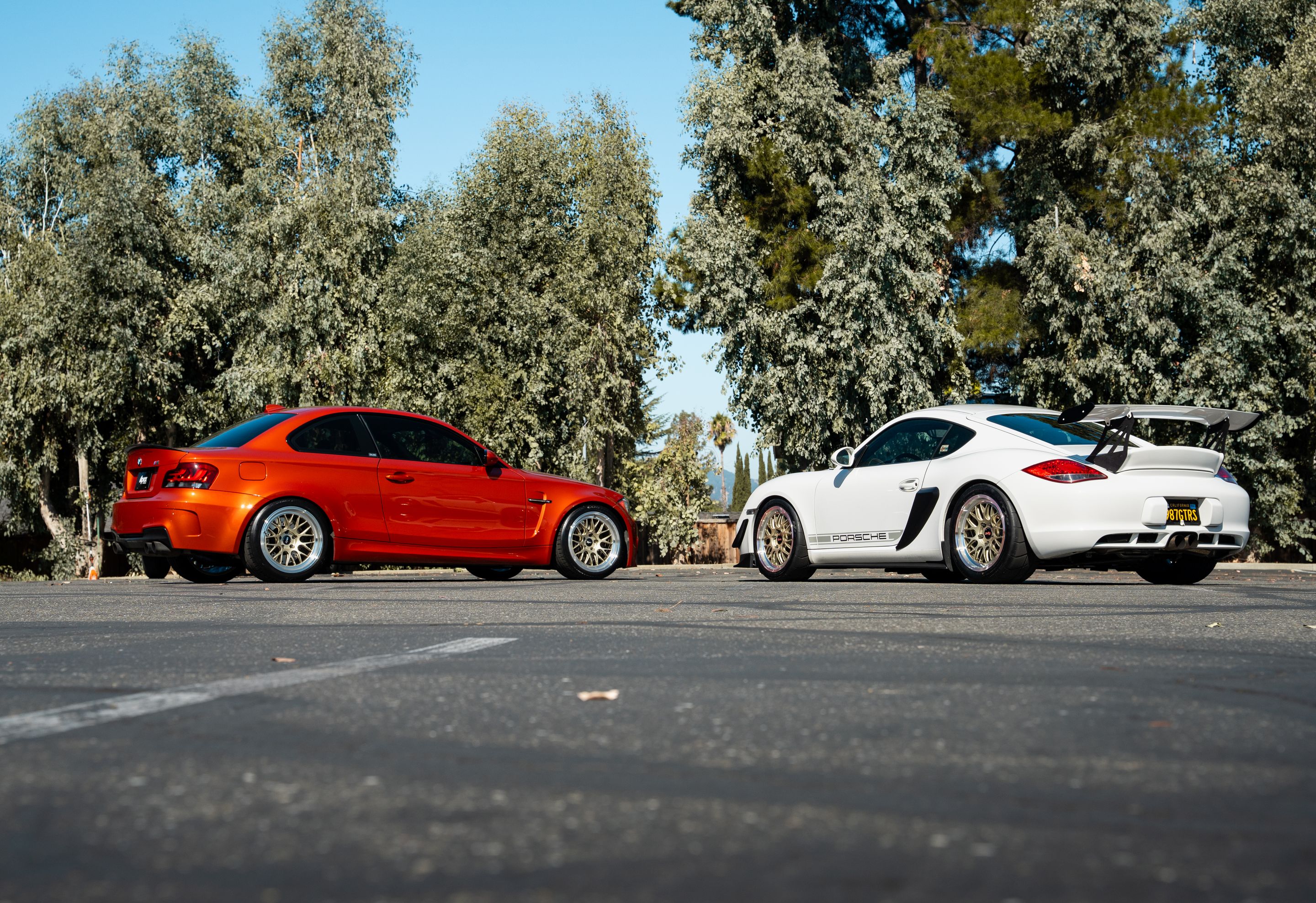 Orange BMW E82 1M with 18" ML-10RT Apex wheels in Machined Lip Gloss Motorsport Gold
