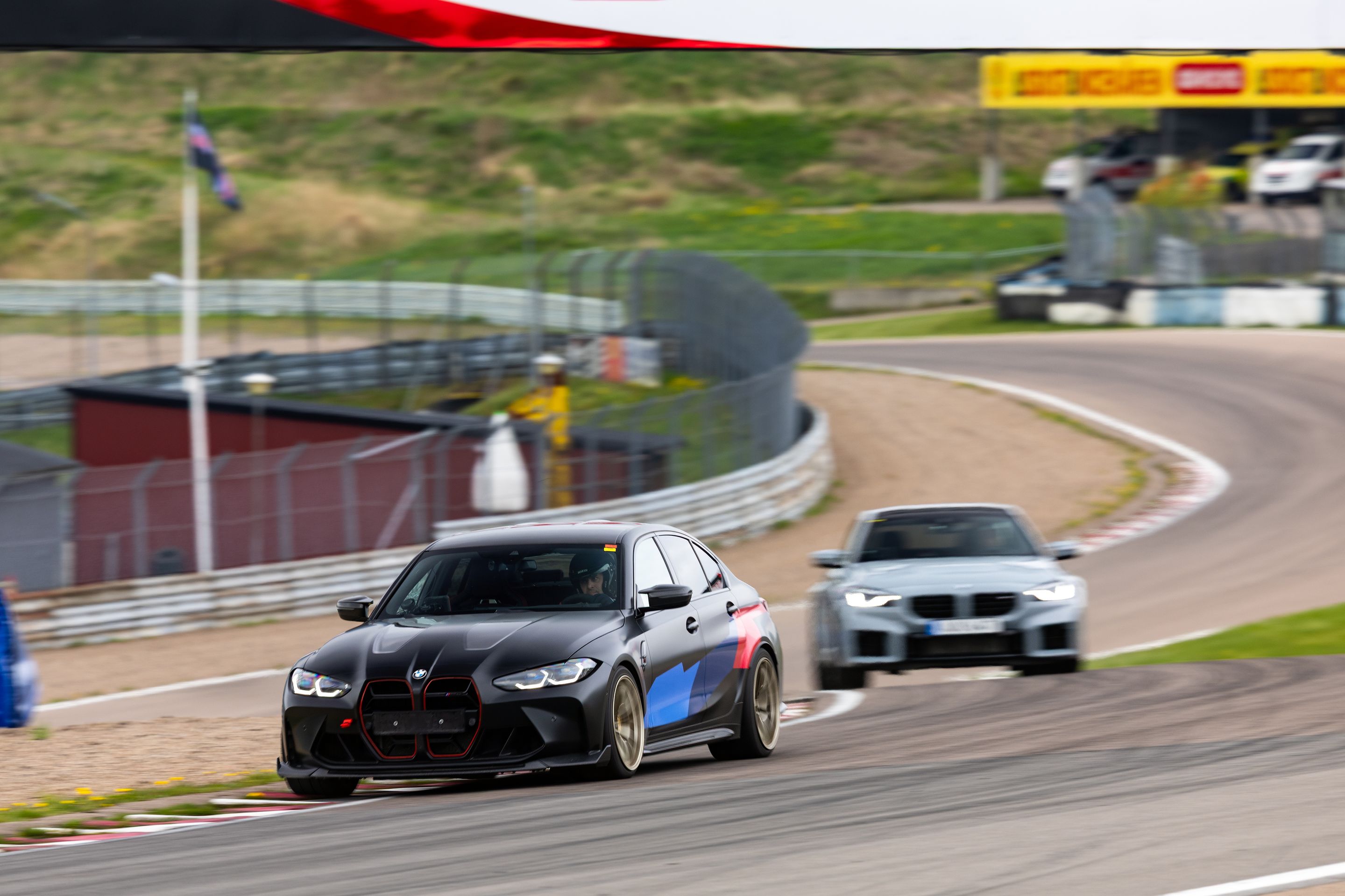 Black BMW G80 M3 with 19" VS-5RS Apex wheels in Motorsport Gold