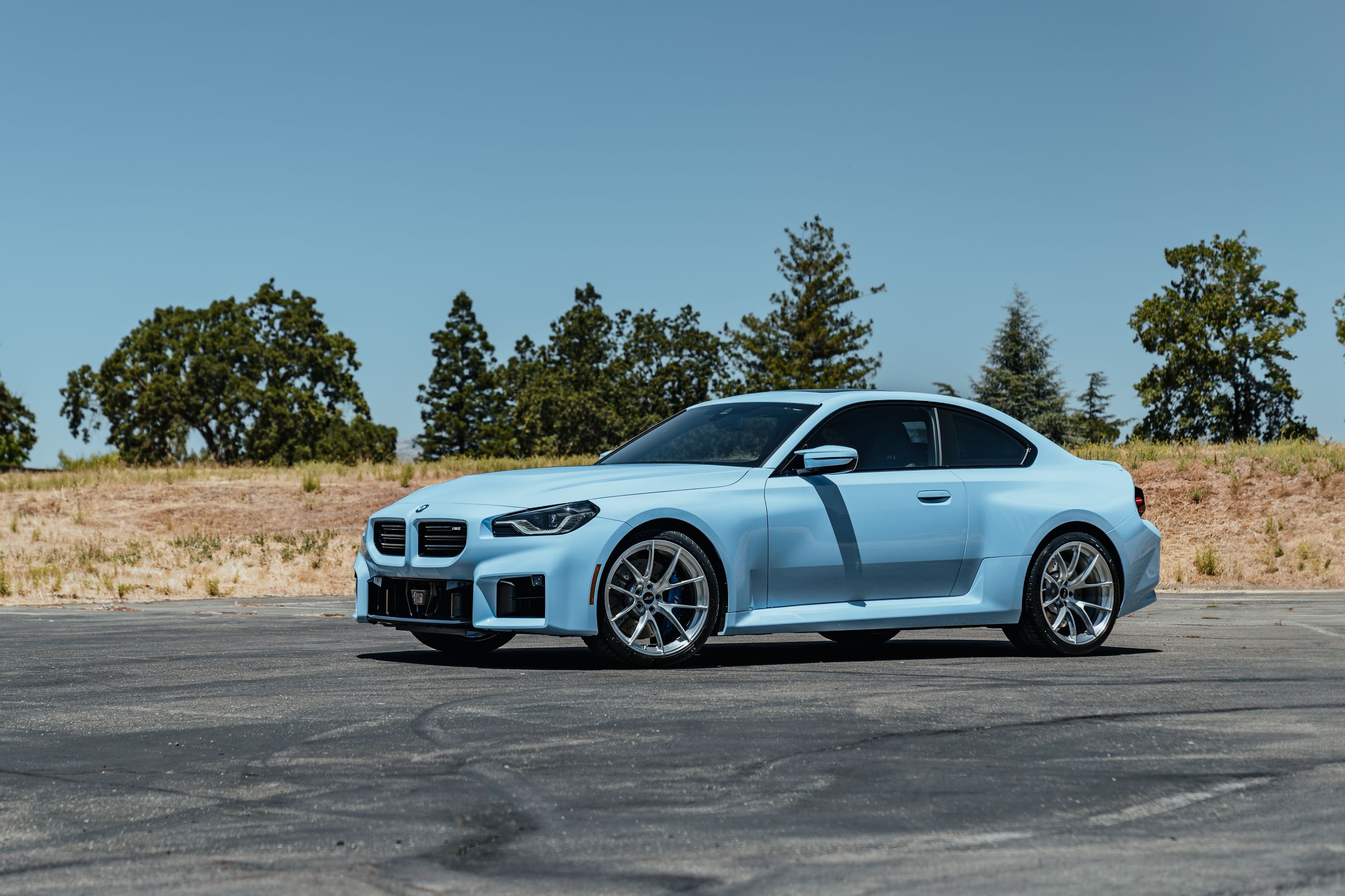 Blue BMW G87 M2 with 20" VS-5RS Apex wheels in Brushed Clear