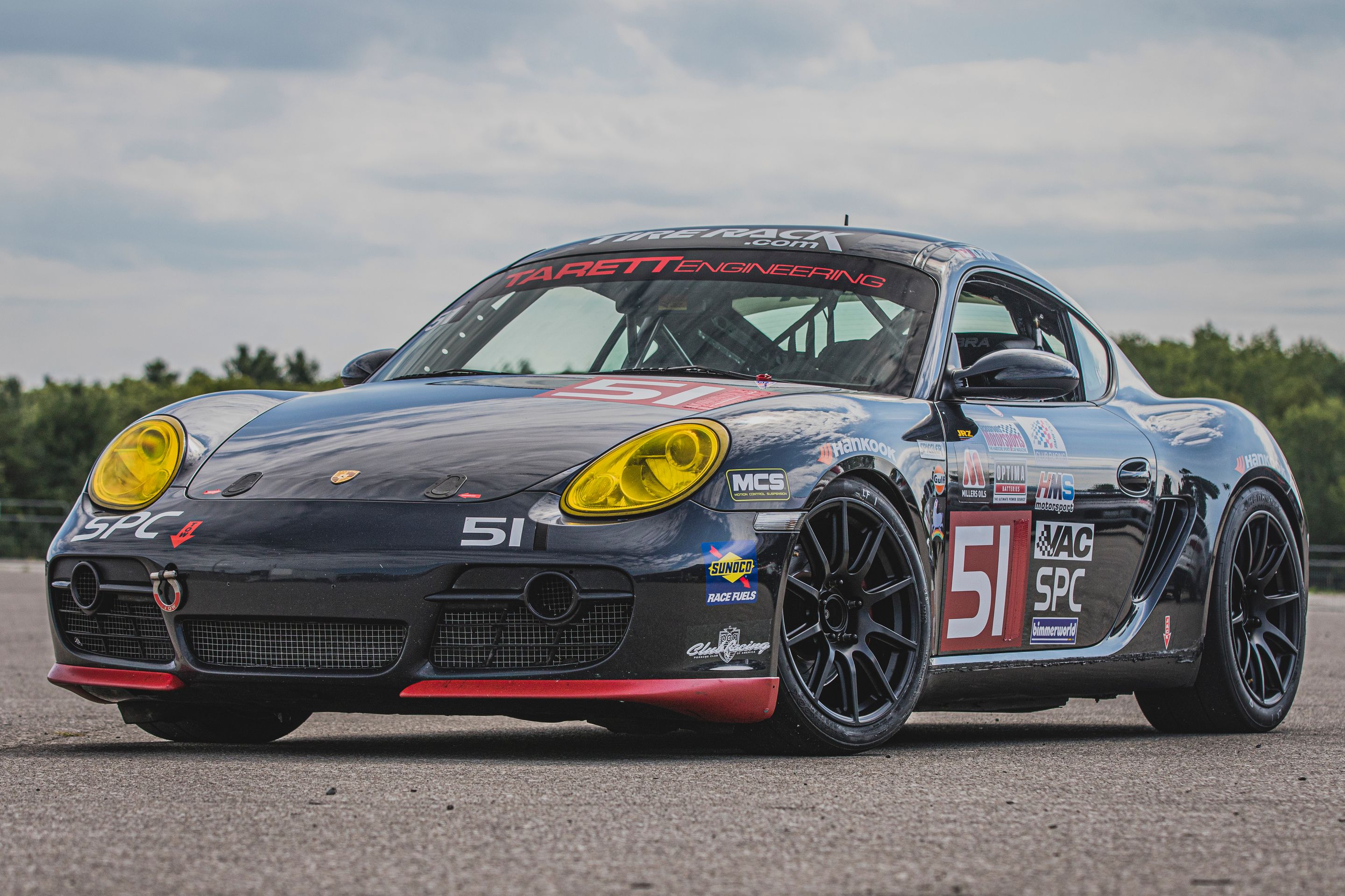 Black Porsche 987 Spec Cayman (SPC) with 18" SM-10 Apex wheels in Satin Black
