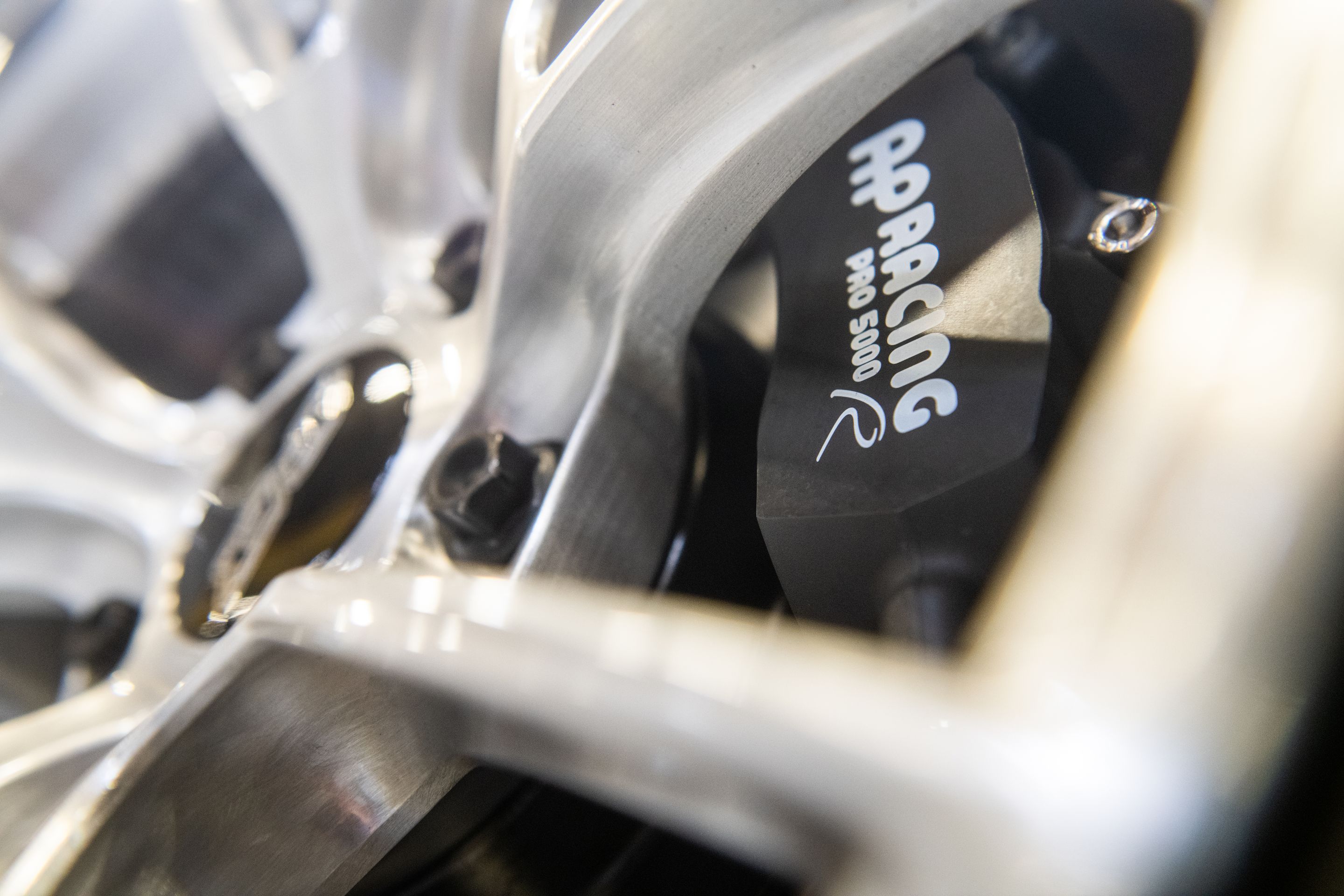 Black Porsche 718 Cayman T with 18" VS-5RS Apex wheels in Brushed Clear