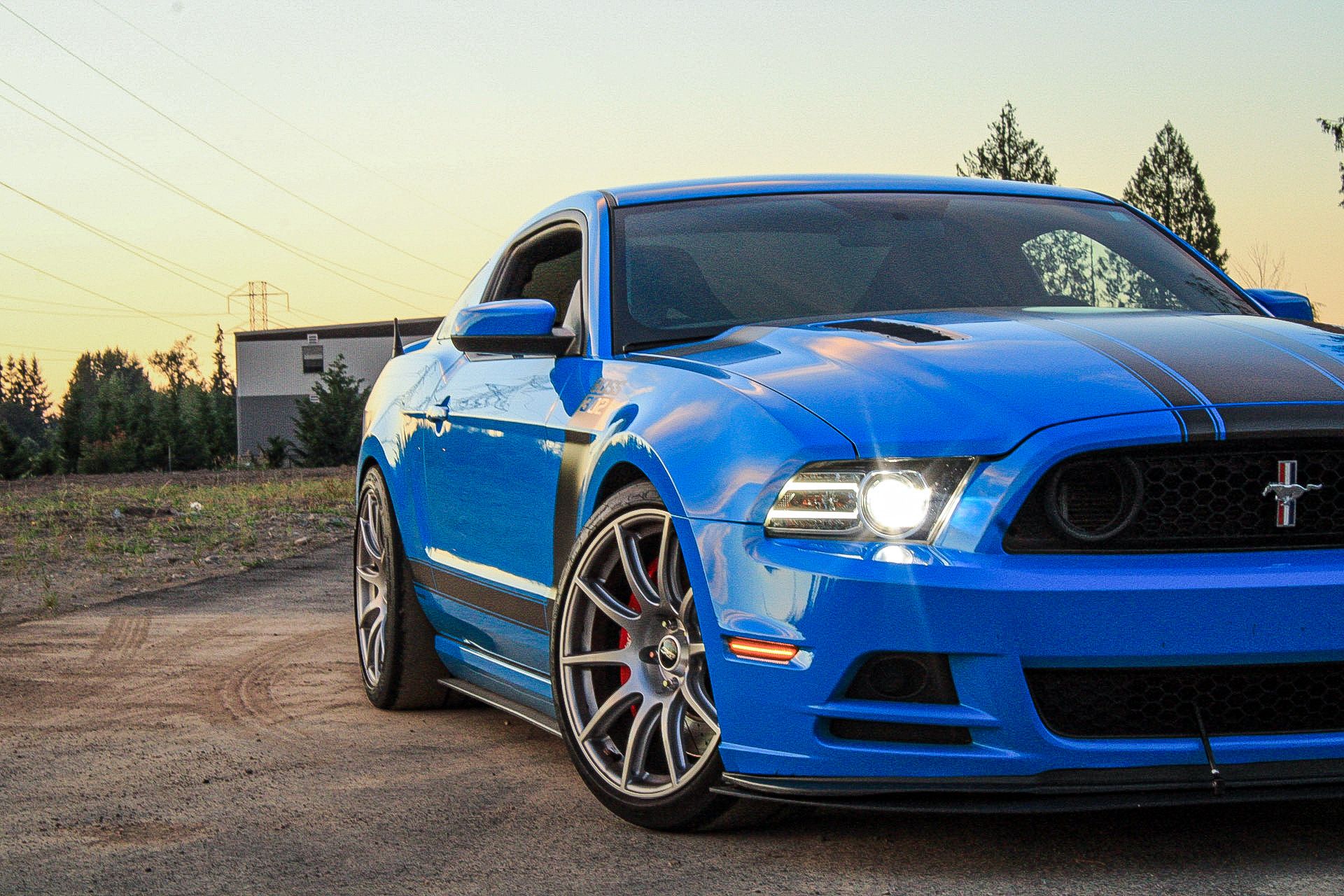 Blue Ford S197 Mustang Boss 302 with 19" SM-10 Apex wheels in Race Silver