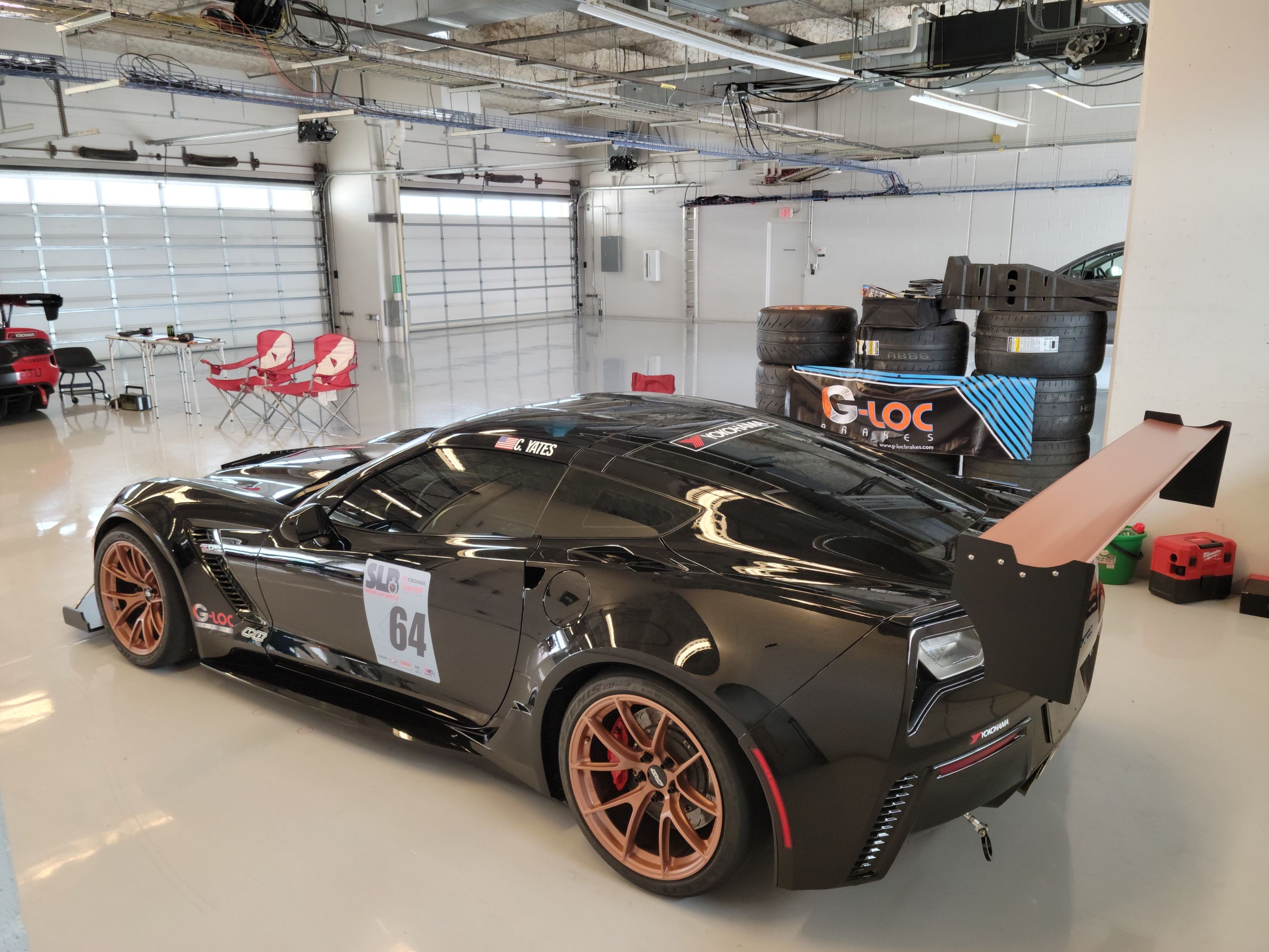 Black Chevrolet C7 Corvette Z06 with 18"/19" VS-5RS Apex wheels in Custom Finish