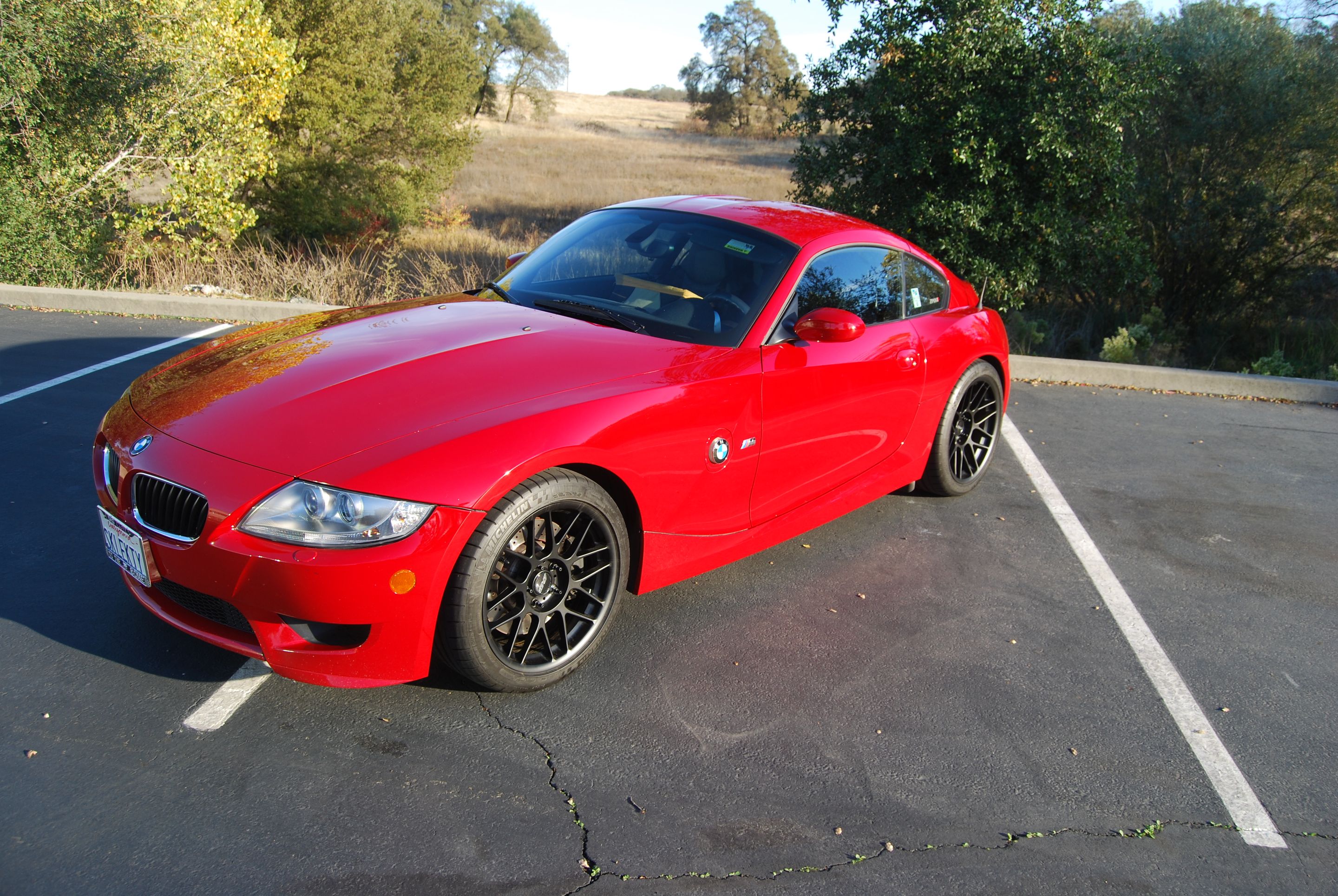 Red BMW E86 Coupe Z4 M with 18" ARC-8 Apex wheels in Satin Black